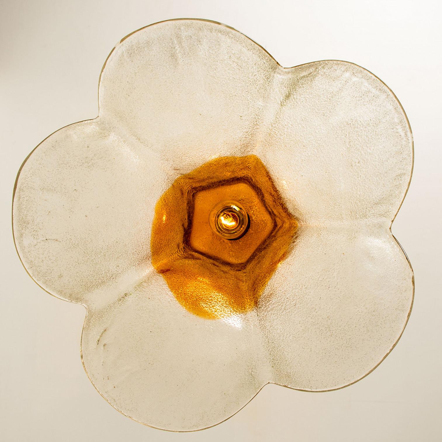 Pendant lamp model LS185 by Carlo Nason for Mazzega.
One large crystal clear and orange colored flower. This beautiful piece is made of thick handmade Murano glass.

We can deliver different kind of rods and cords (see images). Please notice the