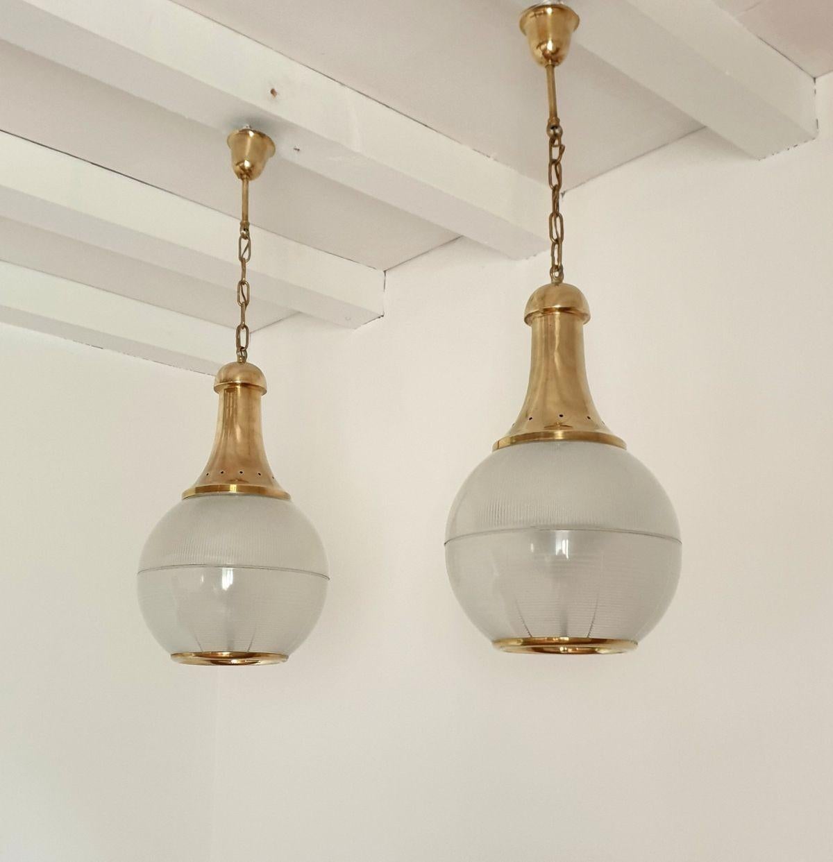 Mid-Century Modern Pair of pendant lights by Dominioni For Sale
