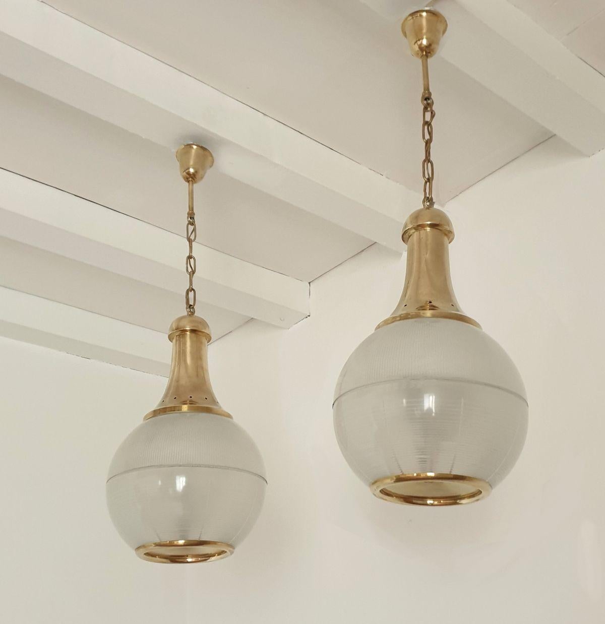 Italian Pair of pendant lights by Dominioni For Sale