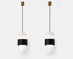 Pair of pendant lights, Editions Maison Lunel, Paris, France, circa 1950/1960