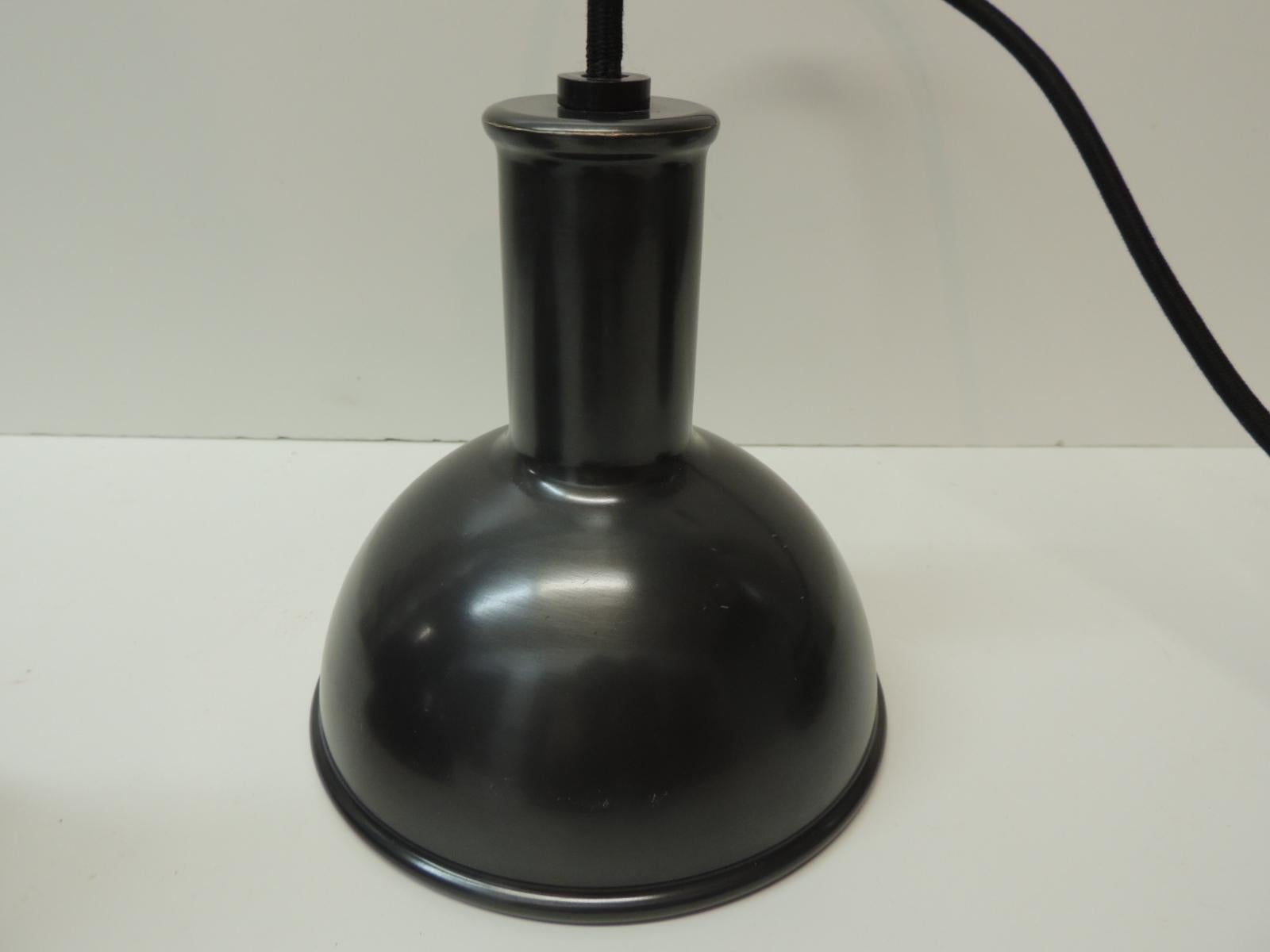 Pair Of Pendant Lights In Gunmetal Color With A Cloth Covered Cord