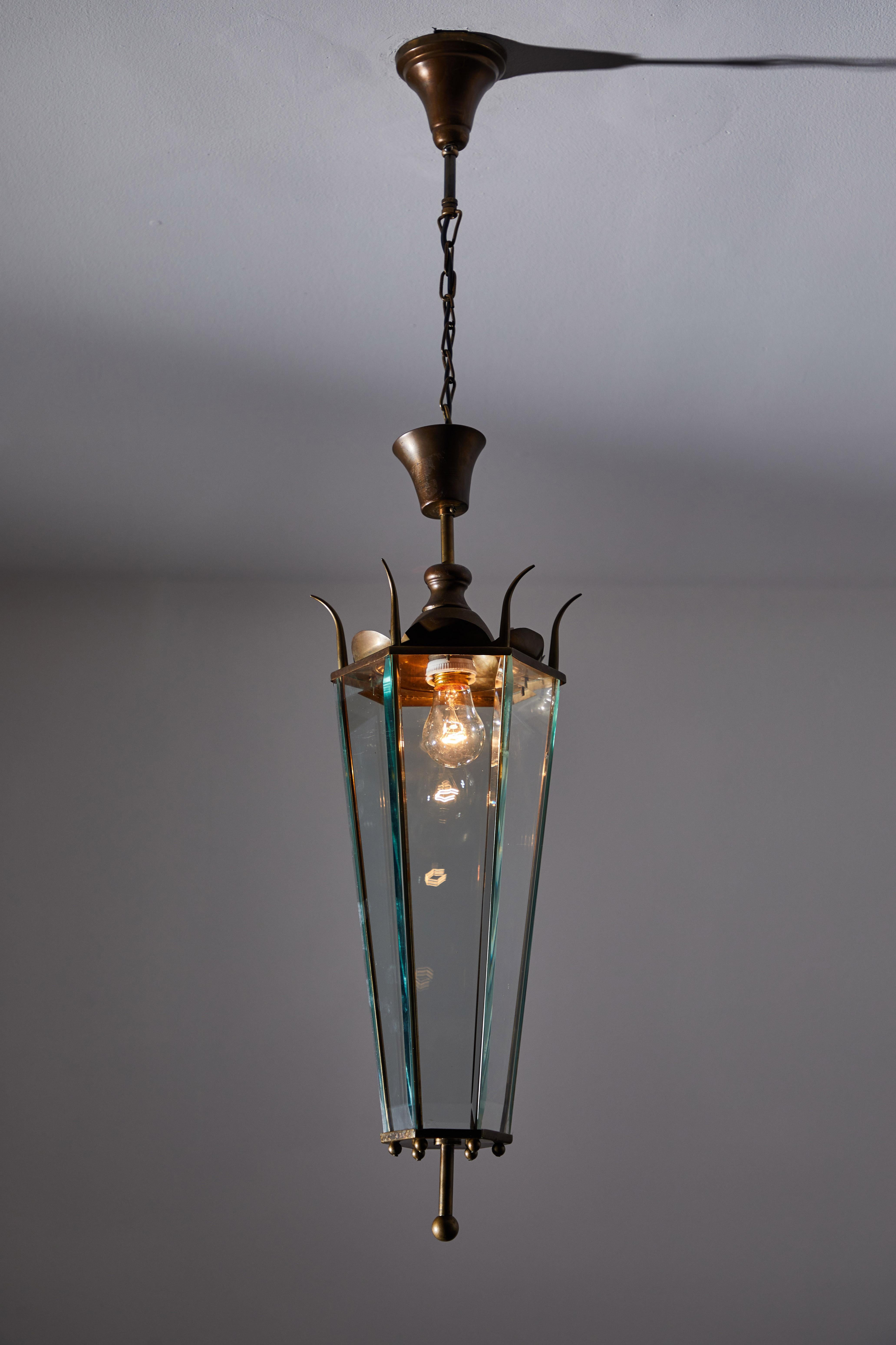 Pair of pendants by Bruno Chiarini. Designed and manufactured in Italy, circa 1940s. Glass and brass. Original canopy. Rewired for U.S. standards. We recommend one E27 60w maximum bulb per light. Bulbs provided as a one time courtesy. Priced and