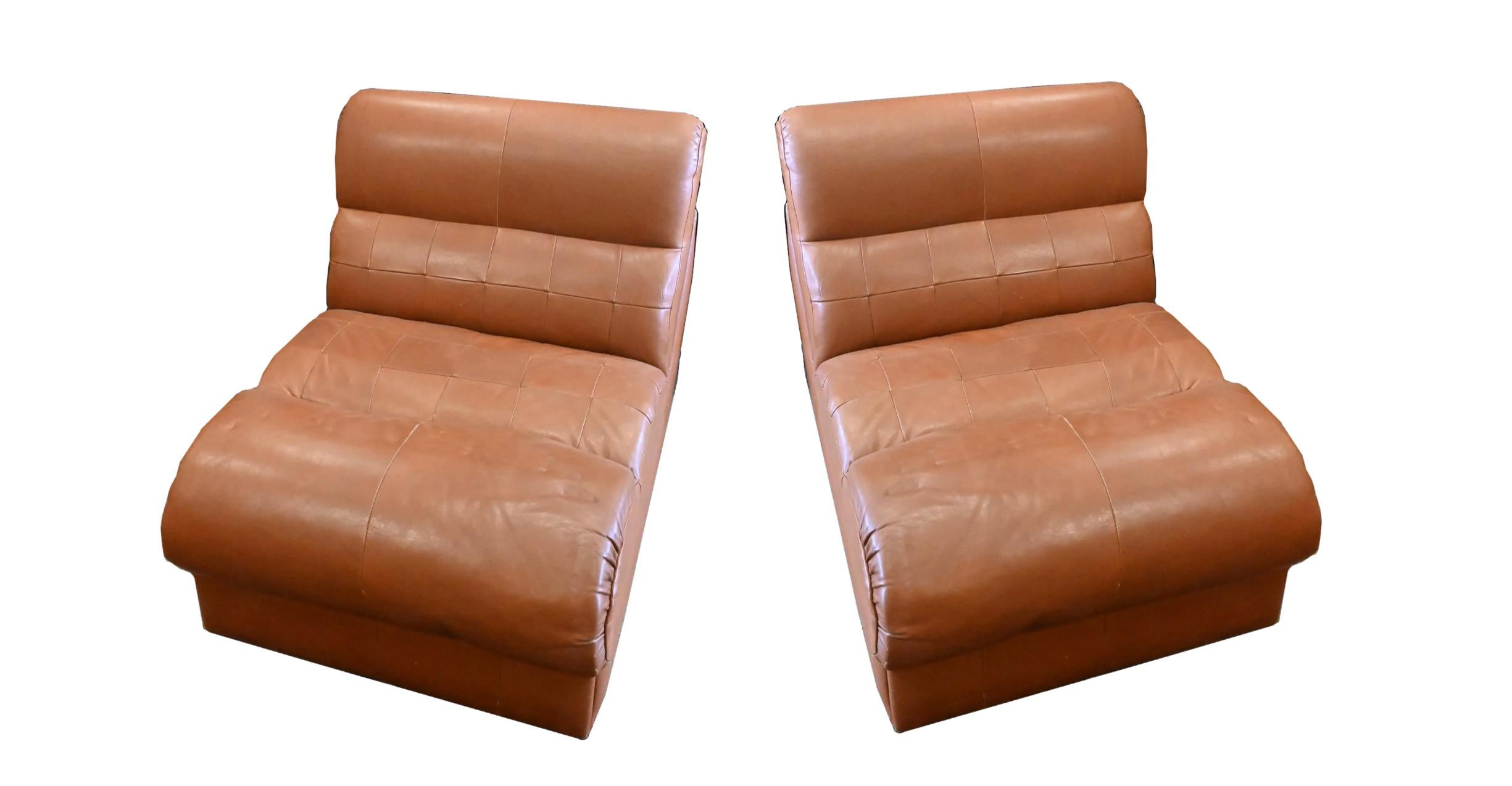 Pair of Percival Lafer midcentury Low Leather Patchwork Slipper Lounge Chairs. Thick soft tan patchwork leather - modular design these (2) units can be used separated or pushed together. Work as great lounge chairs possibly part of a larger Modular