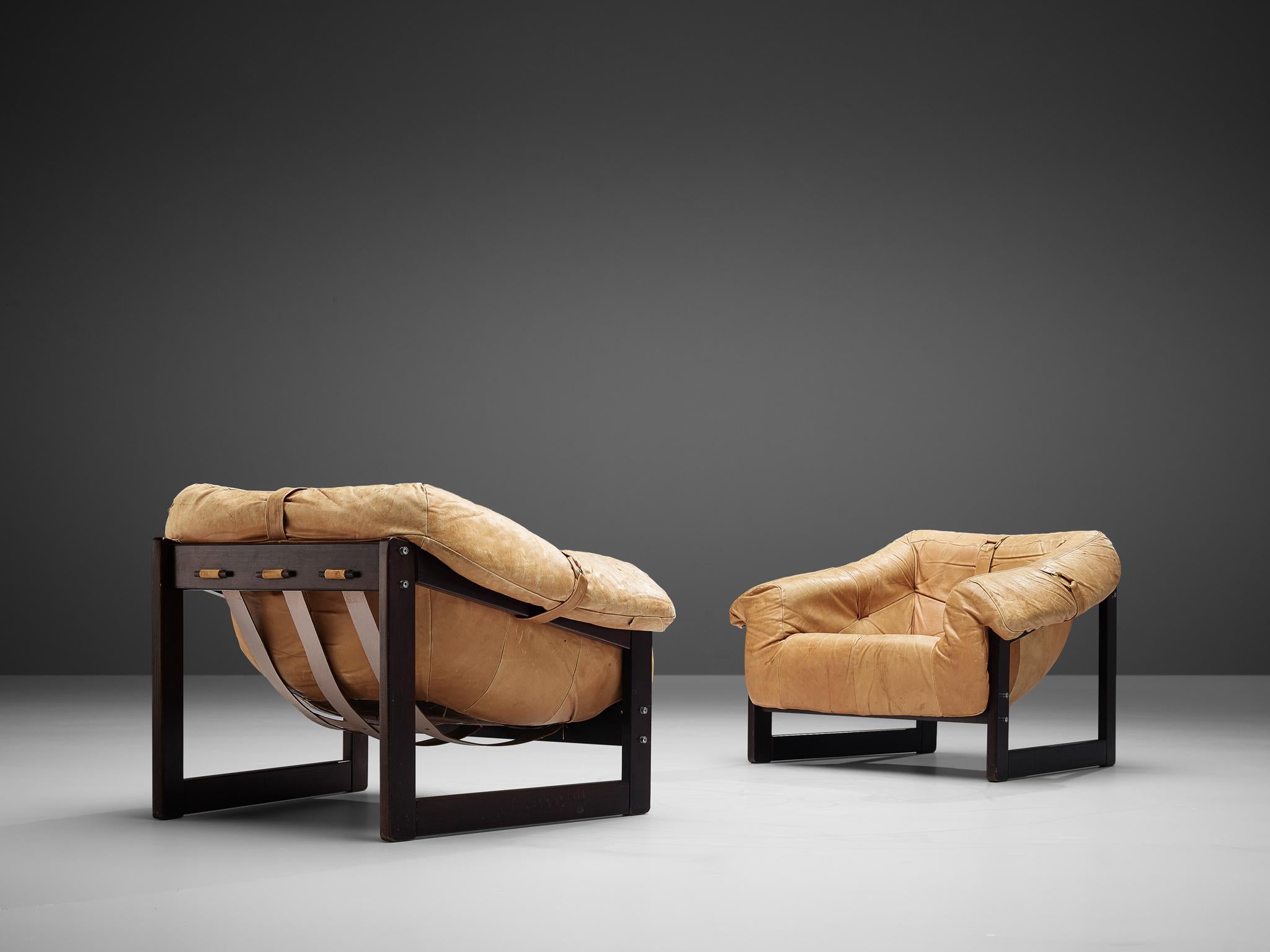 Percival Lafer for Moveis Patenteados, pair of lounge chairs model MP-091, cognac leather upholstery, Brazil, 1960s

A wonderful set of lounge chairs by Brazilian designer Percival Lafer. These chairs consists of two geometric shaped frames,