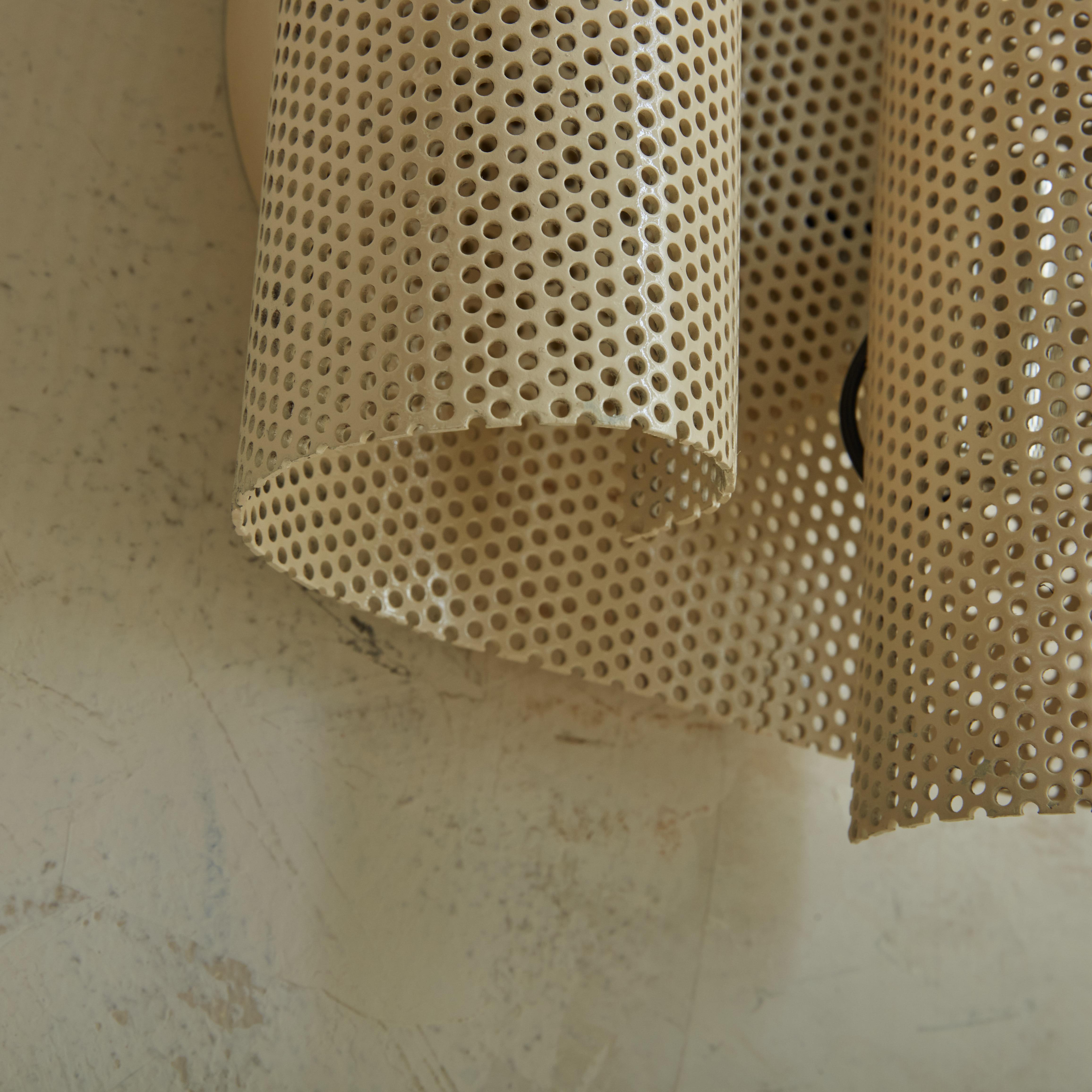 Pair of Perforated Metal Sconces in the Style of Mathieu Matégot In Good Condition In Chicago, IL