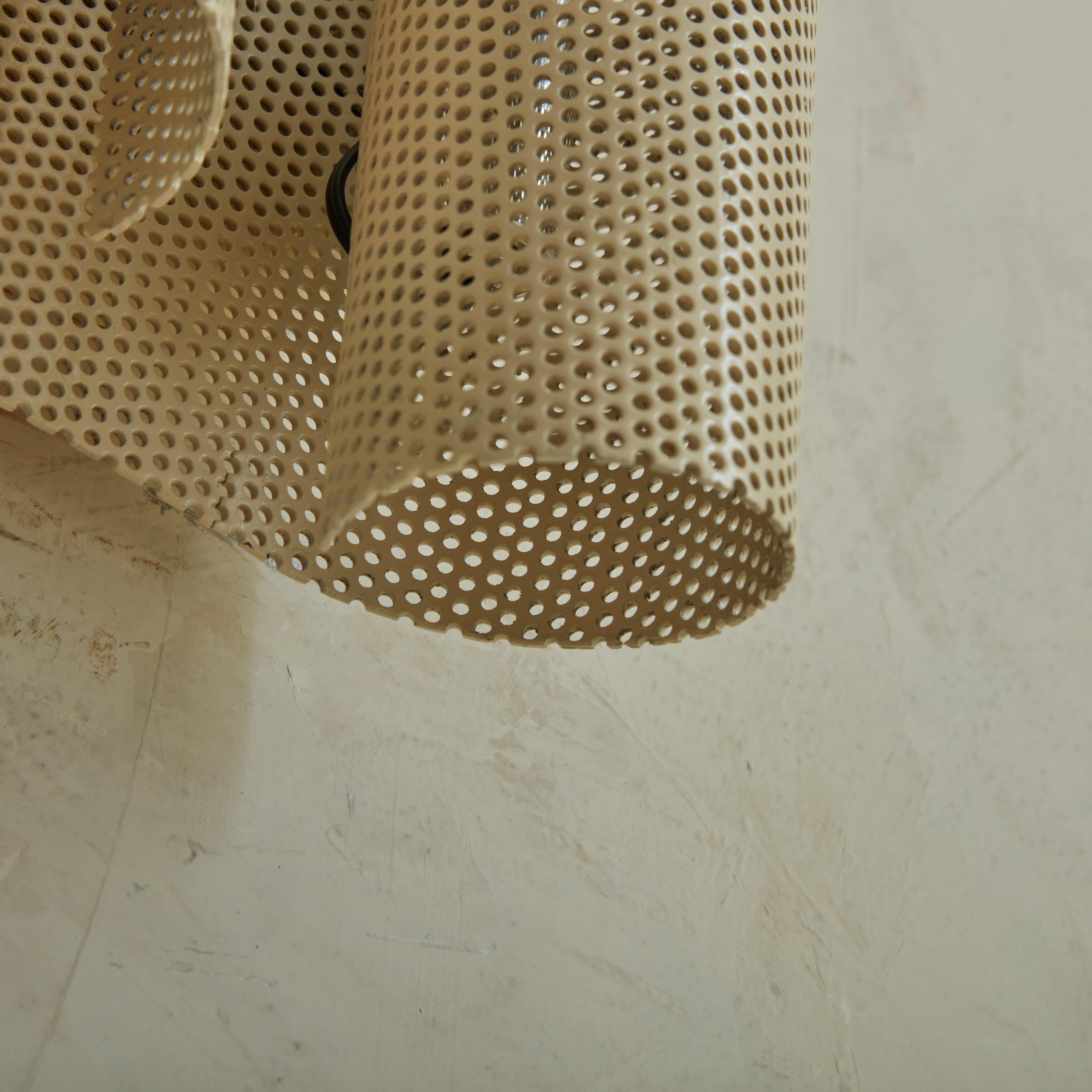 Late 20th Century Pair of Perforated Metal Sconces in the Style of Mathieu Matégot