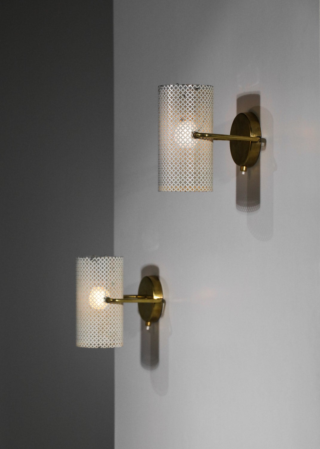 Mid-Century Modern Pair of Perforated Steel Sconces in the Pierre Guariche Style, G685