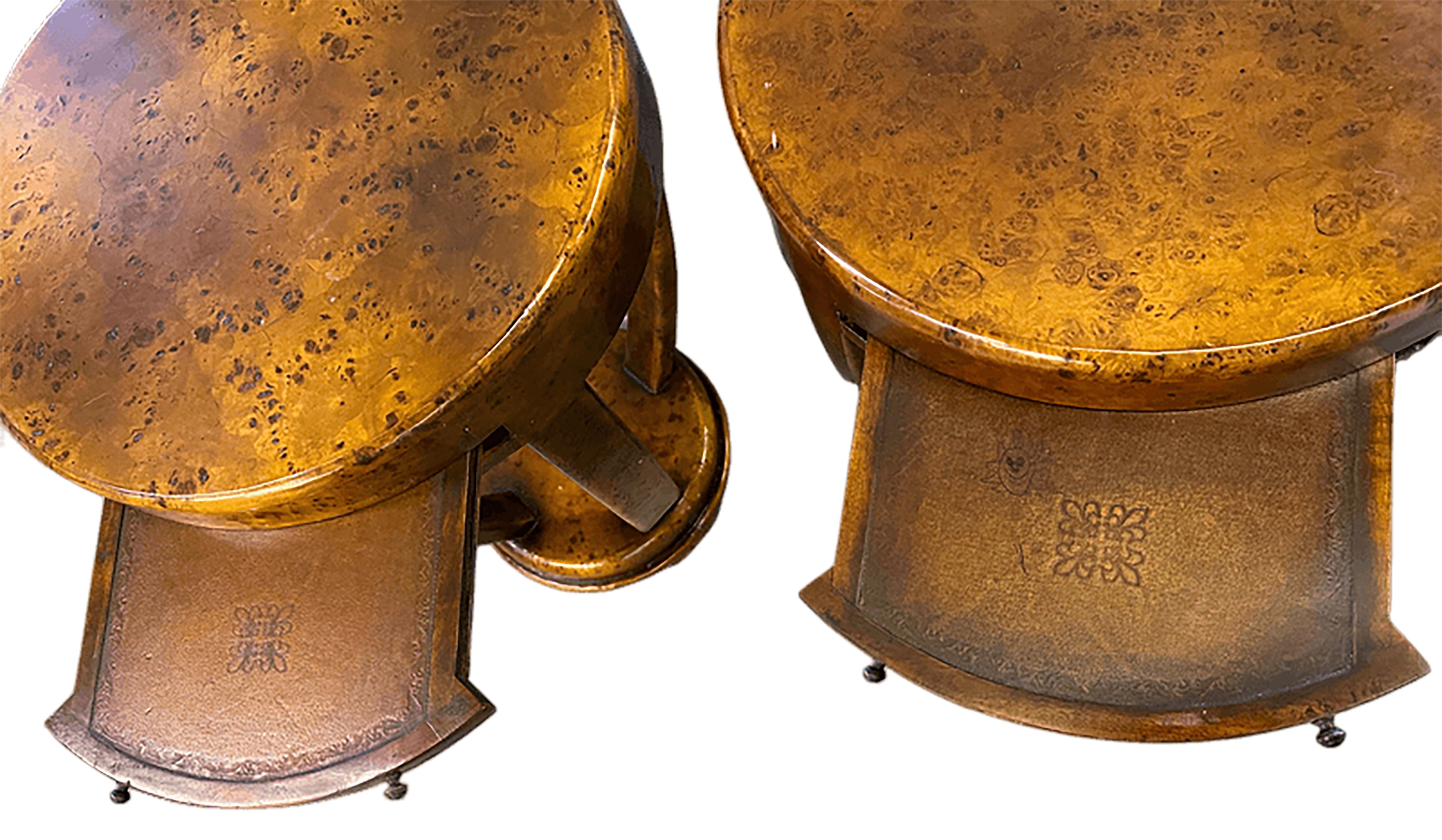 A handsome pair of period biedermeier occasional (side) tables. With a shelf just under the top. A small leather upholstered drink top can be pulled out with small steel knobs. Tooled leather lines each pullout. The piece is made from a diligently