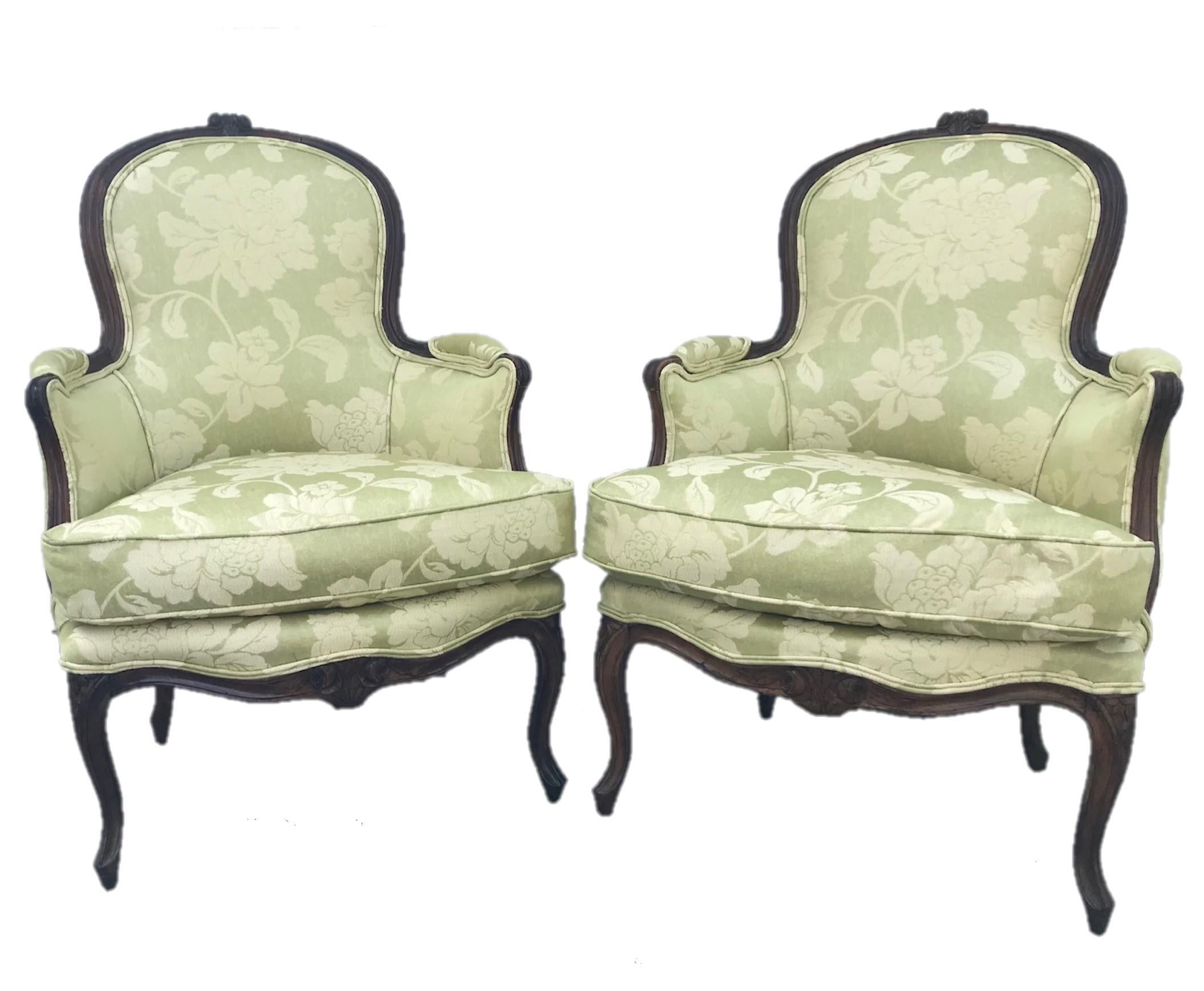 Pair of period French Louis XV carved bergeres cabriolet, Paris, circa 1760.

The regal bergère cabriolet is referred to as the chair of Kings. This pair is finely hand carved in walnut with flowers and intricate mouldings. The bergeres have an