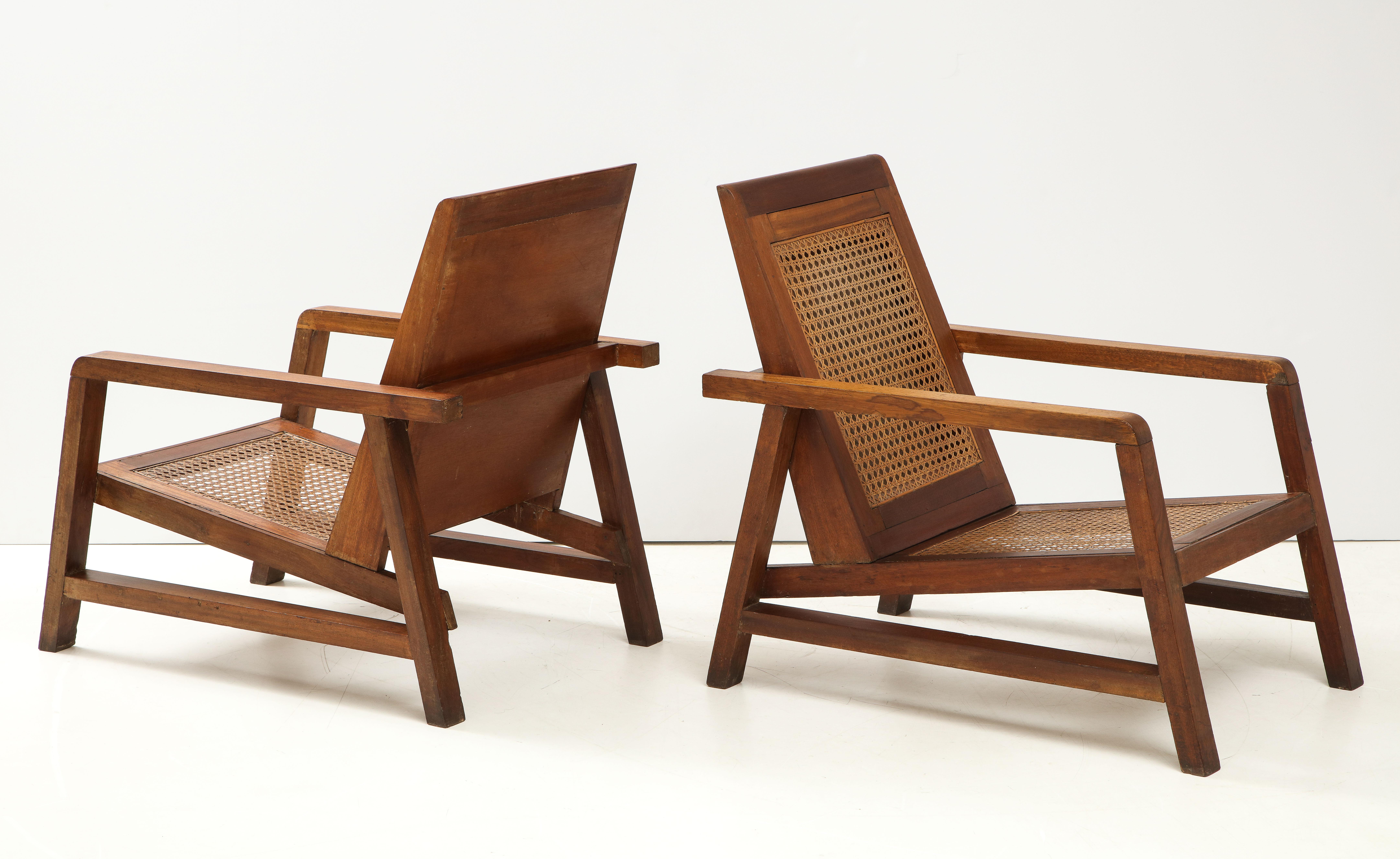 Pair of chairs in the style of Pierre Jeanneret for Chandigarh, made by an architect in the modernist form.
Mahogany & Cane 

Measures: H. 32.5, W 24, D 34 in.
  