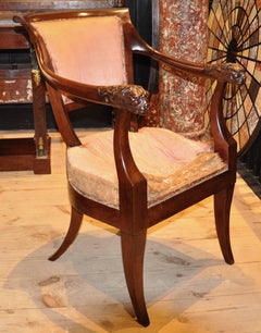 Pair of Period Russian or Austrian Neoclassical Walnut Chairs with Lion Motif