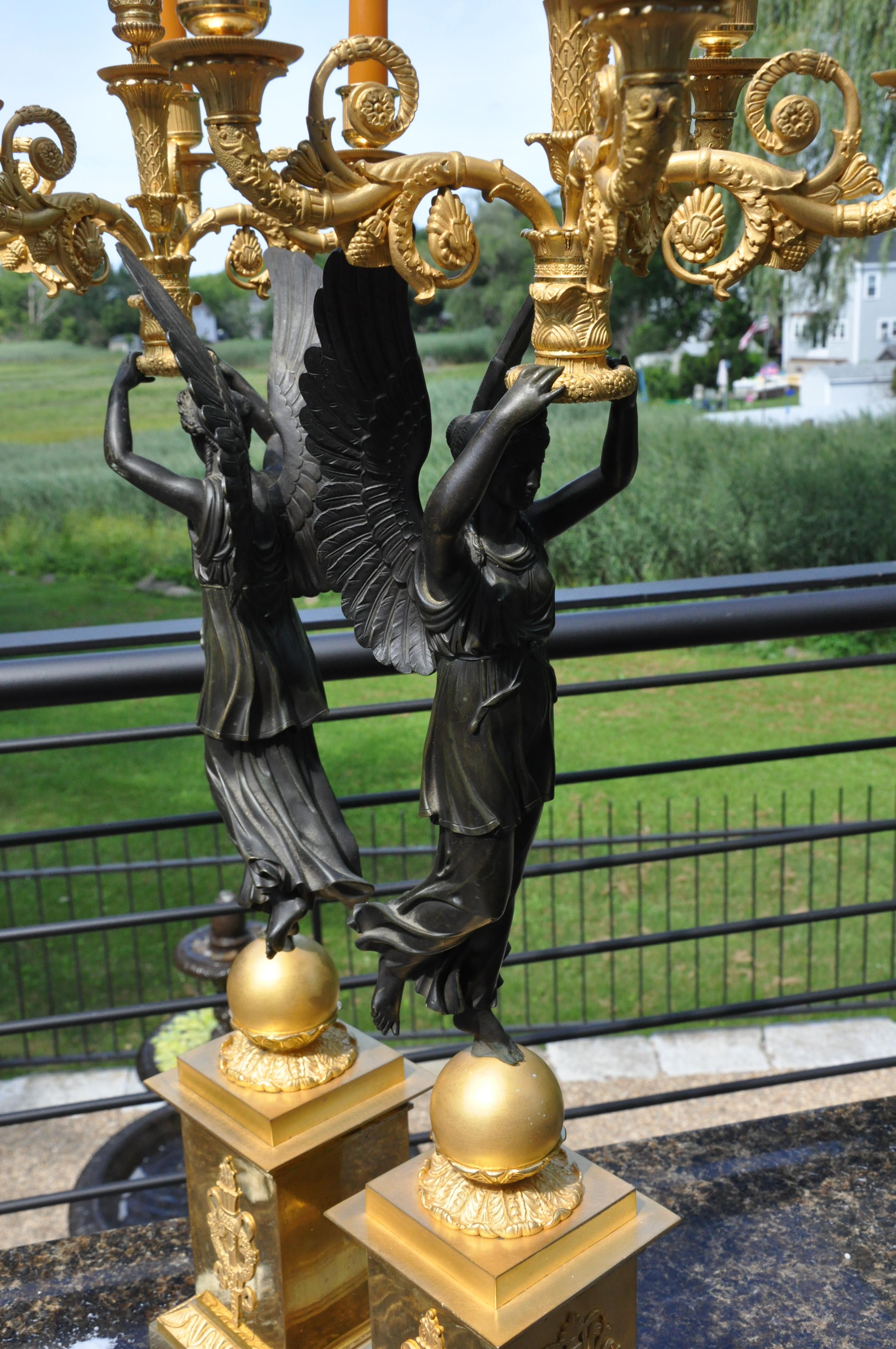 Patinated Pair of Period Signed French Empire Ormolu and Bronze Figural Candelabra