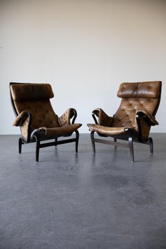 Pair of Pernilla Leather Lounge Chairs by Bruno Mathsson for DUX