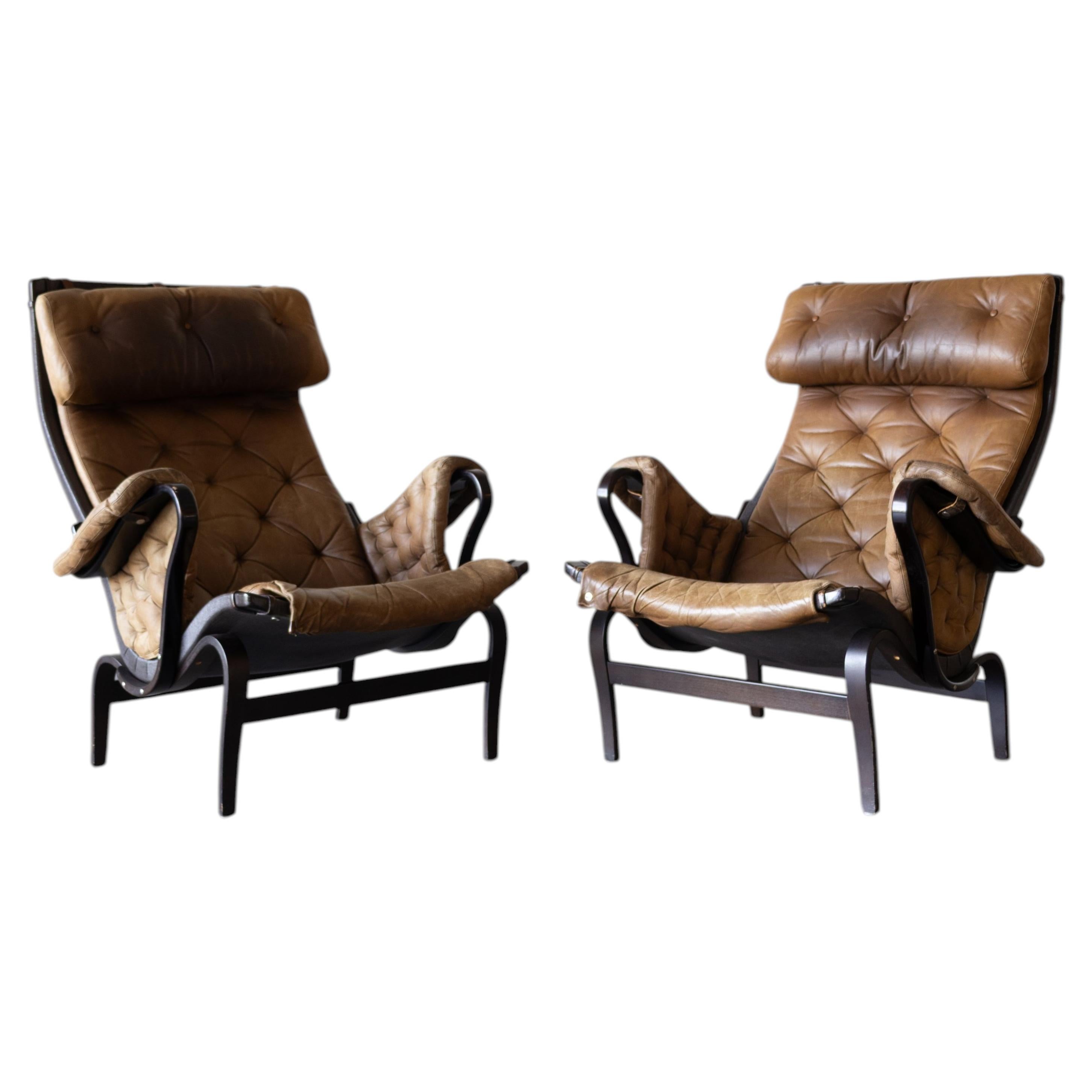 Pair of Pernilla Leather Lounge Chairs by Bruno Mathsson for DUX