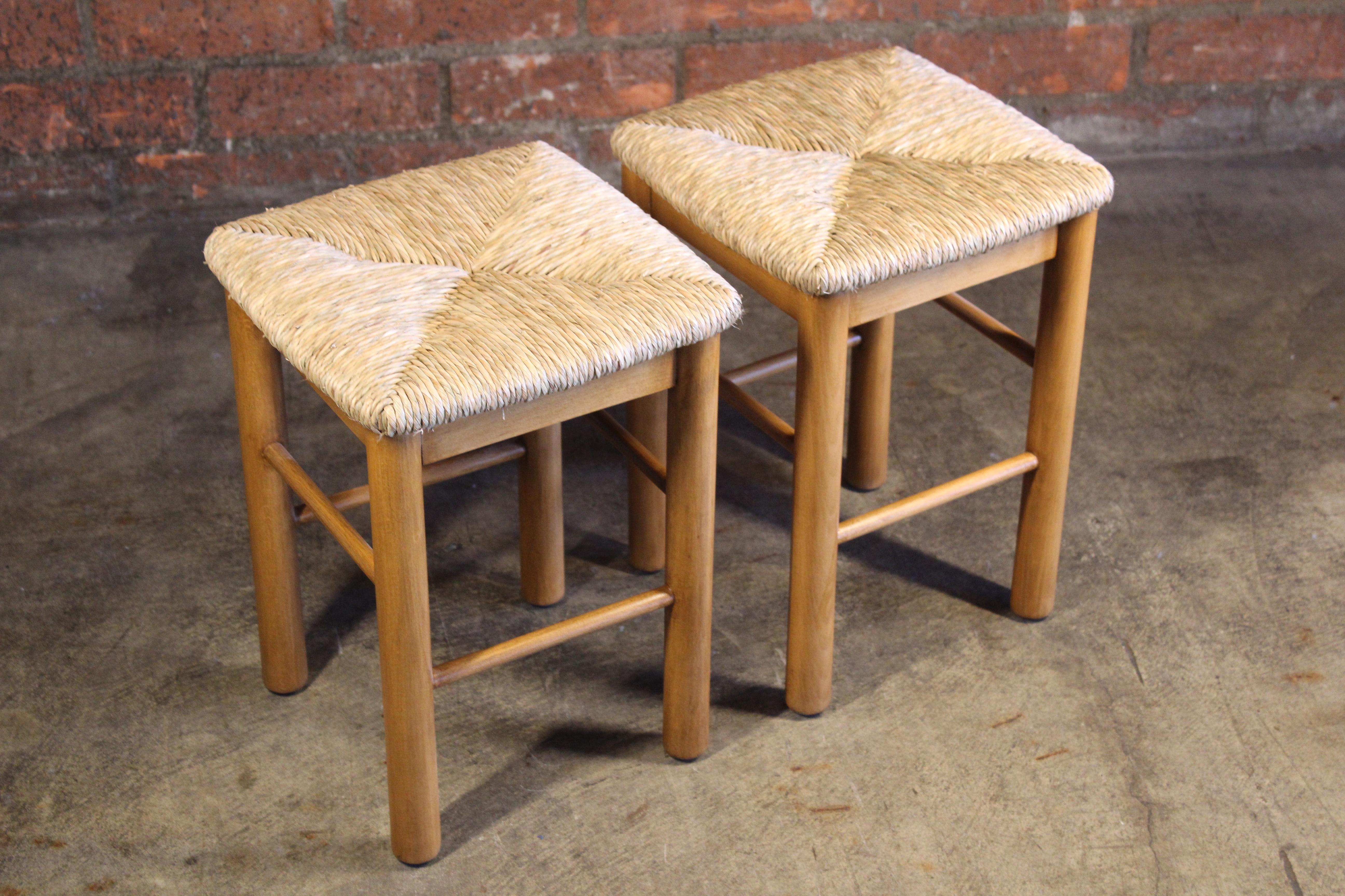 Pair of 1960s French stools with new natural rush woven seats.