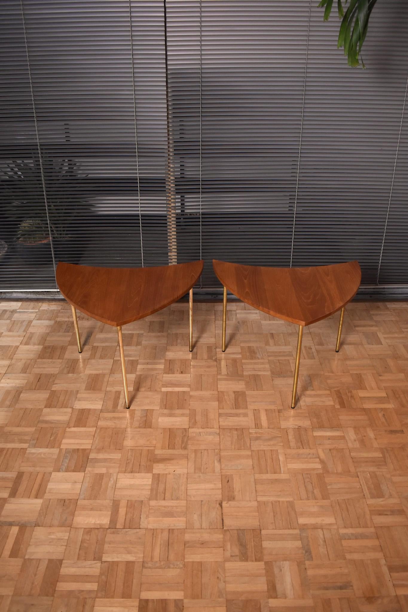 A very hard to find pair of Pinwheel tables designed in the mid-1950s by Peter Hvidt & Orla Molgaard Nielsen.

At the time of writing we have three pairs available which is a complete set. The interlocking geometry allows a complete circle to be