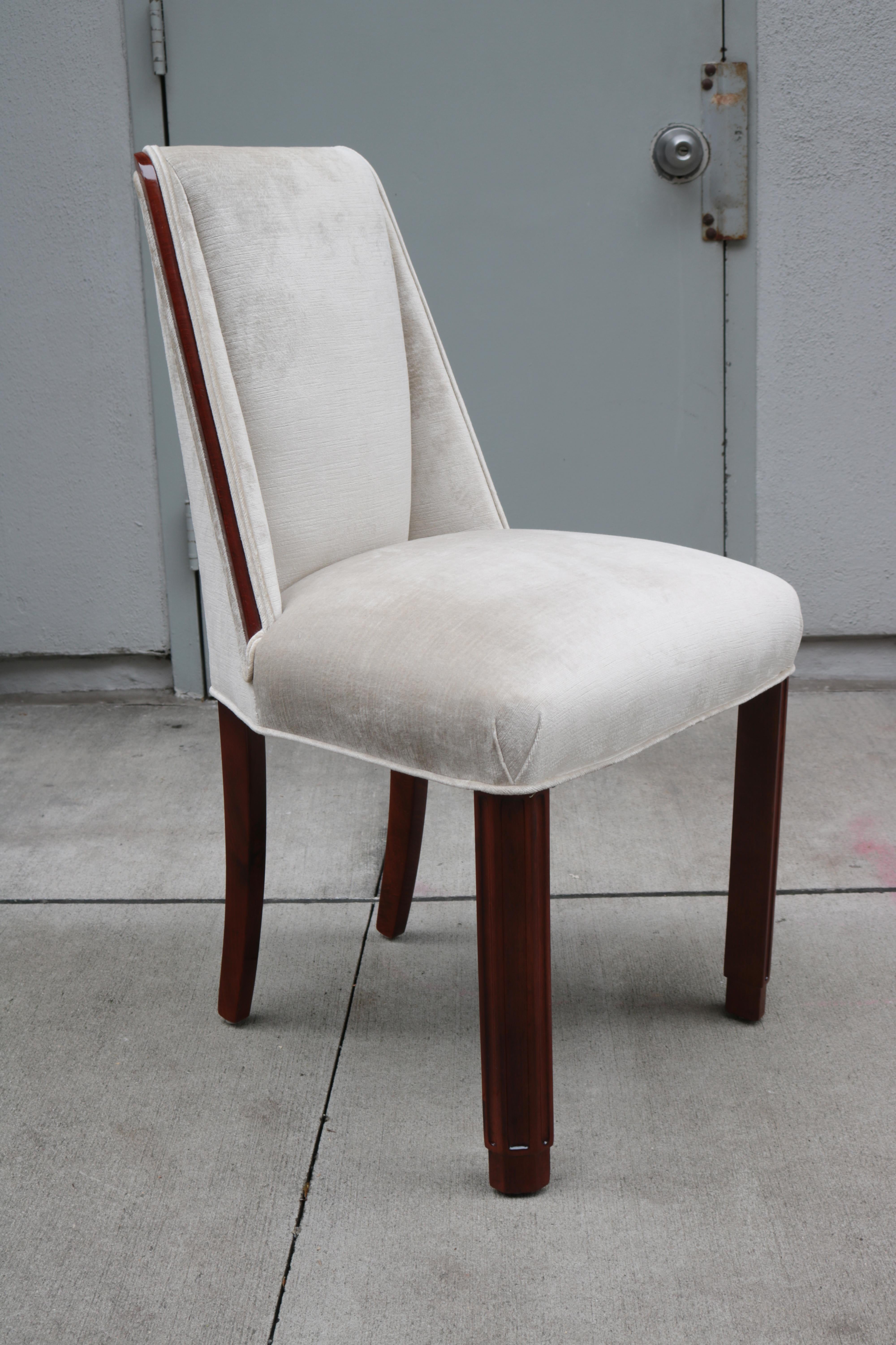 A pair of Art Deco side chairs.
Mahogany legs and details.