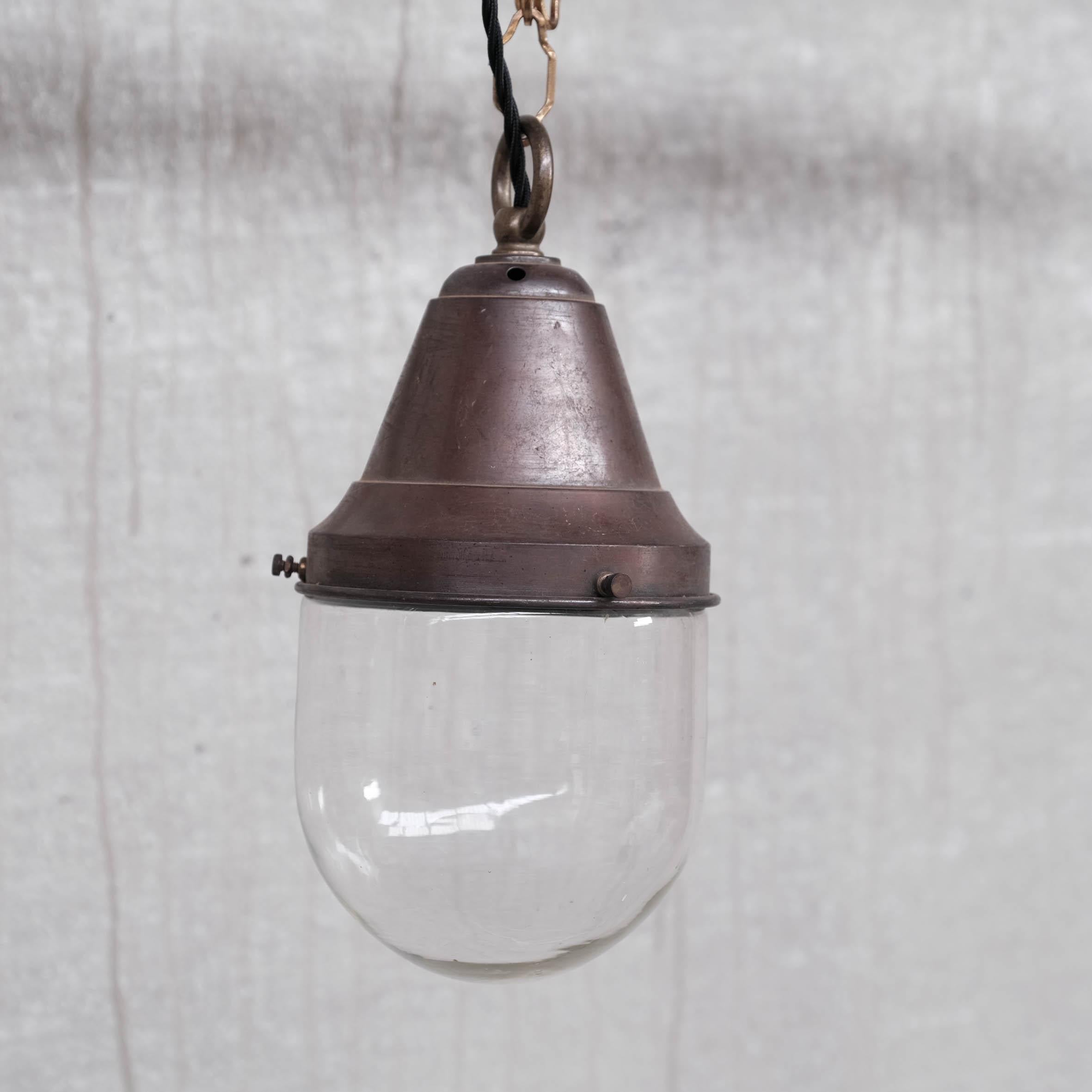 Mid-Century Modern Pair of Petite Brass and Clear Glass Industrial Pendants For Sale