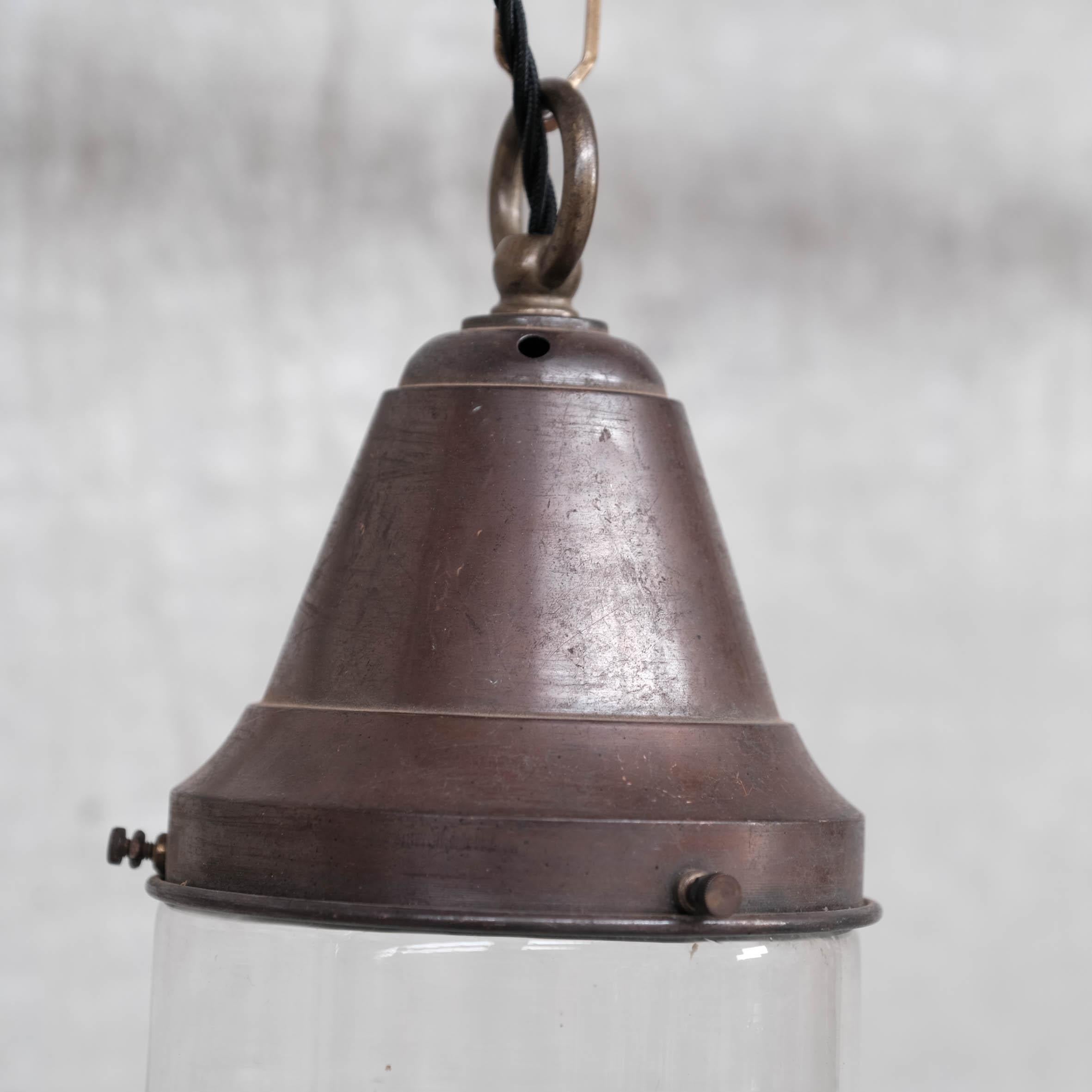 French Pair of Petite Brass and Clear Glass Industrial Pendants For Sale