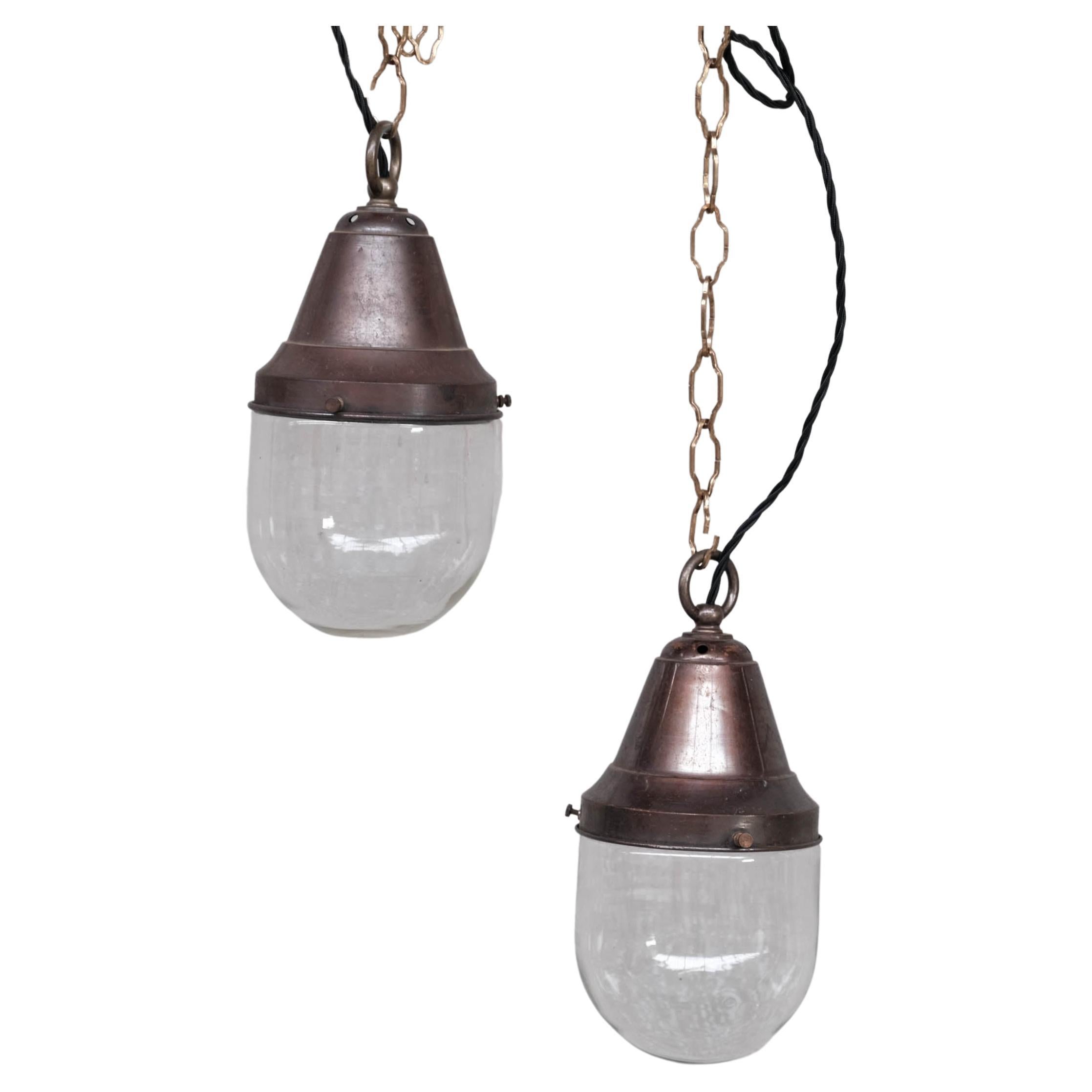 Pair of Petite Brass and Clear Glass Industrial Pendants For Sale