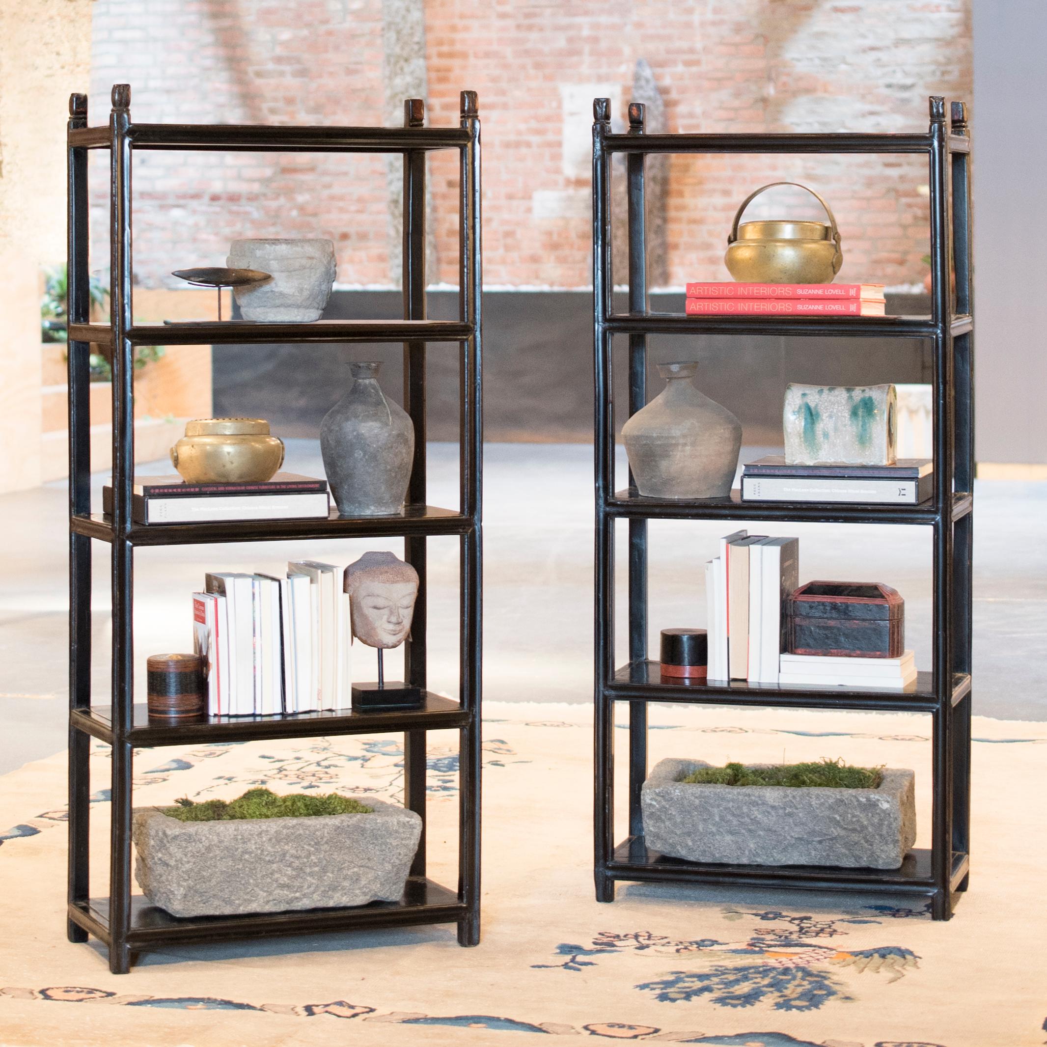 Dated to the early 20th century, these petite collector's shelves are seamlessly constructed with clean lines and open sides. Once the centerpiece of a scholar’s studio, these open shelves were ideal for displaying stacks of books, scholars' rocks,