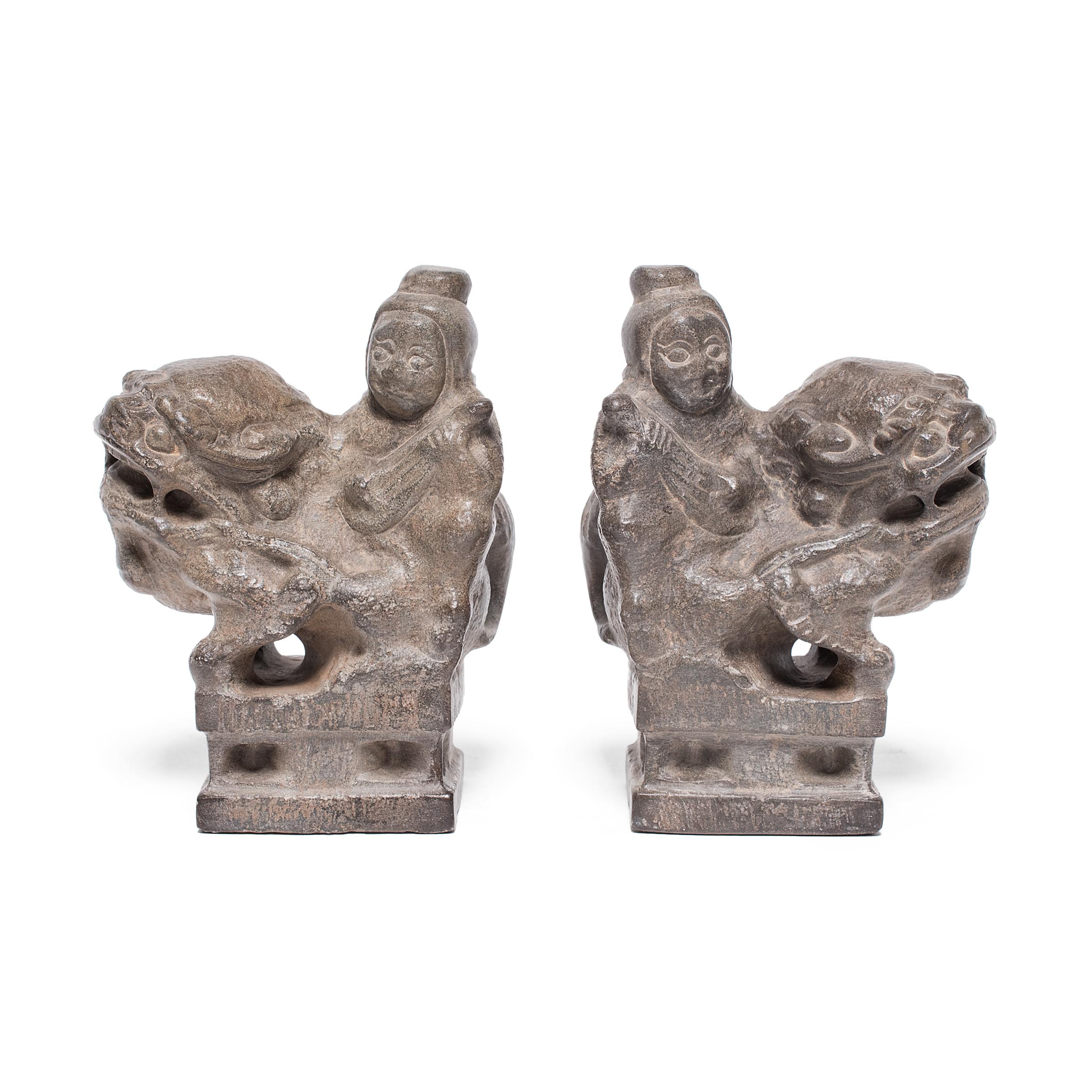 With curly manes and playful expressions, these petite stone fu dogs are adorable companions and benevolent guardians of the home. Also known as shizi, the pair represents yin and yang, the dual forces of the universe. Seated in mirrored postures