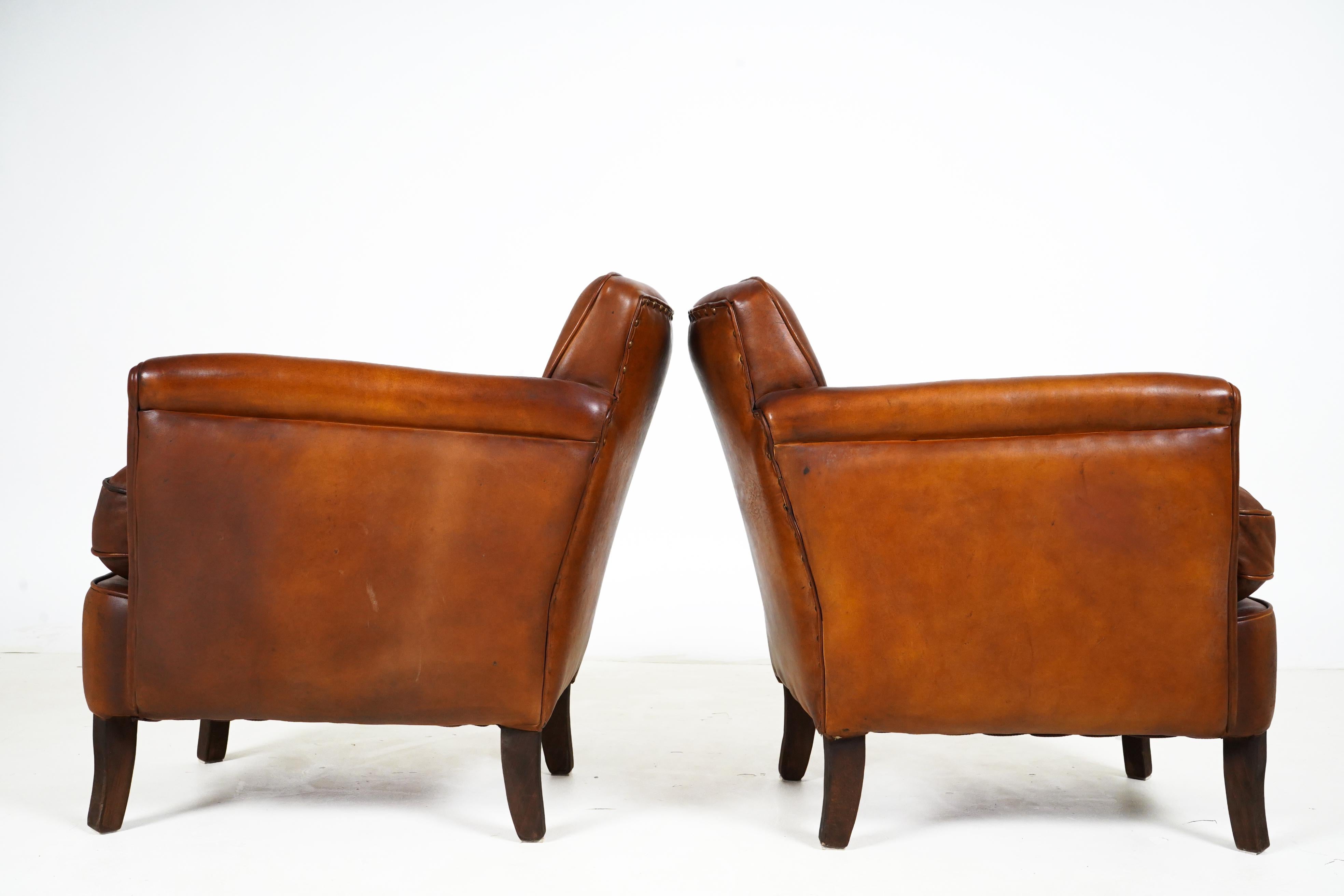 Contemporary Pair of Petite French Leather Club Chairs