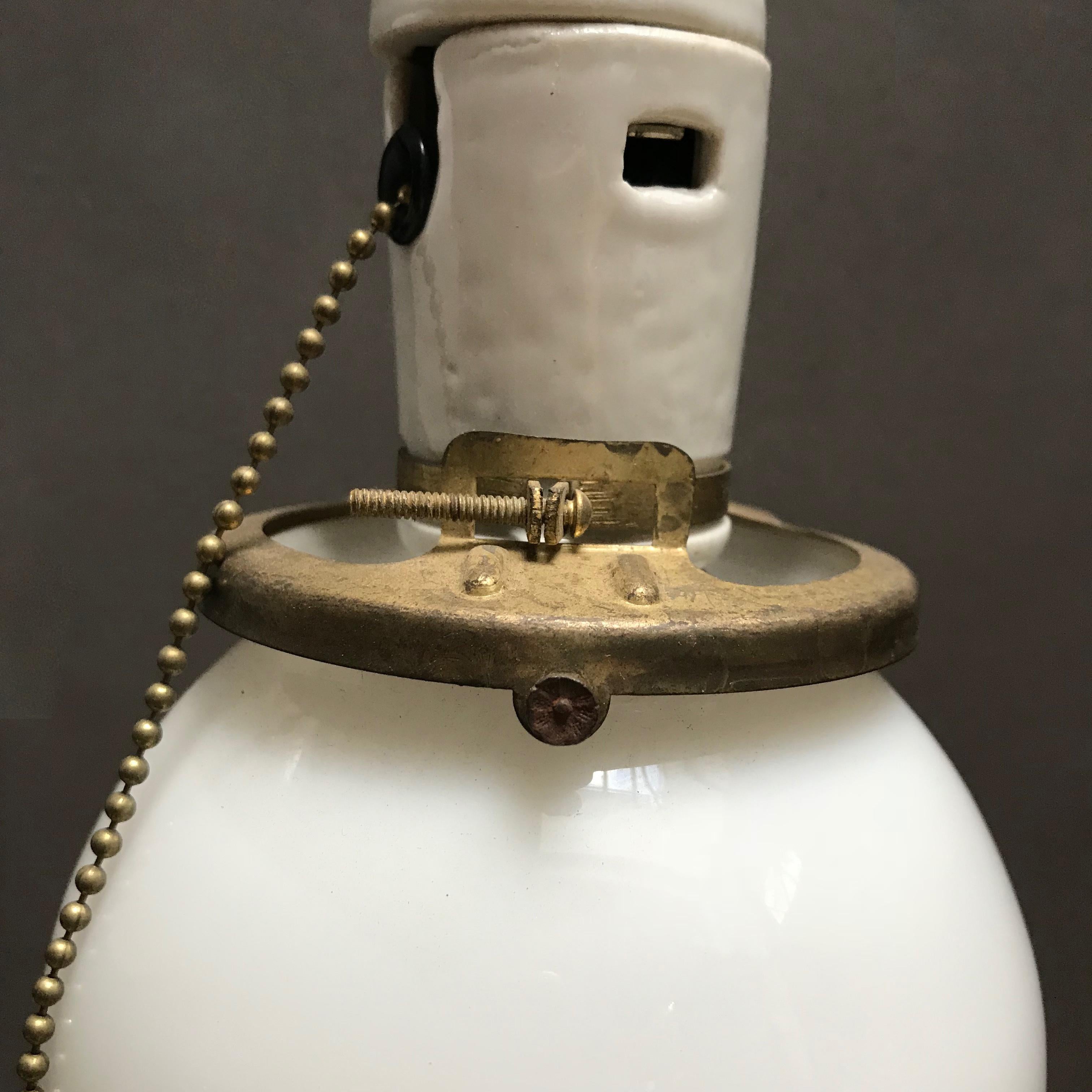 Pair of Petite Industrial Milk Glass and Porcelain Globe Pendant Lights 1