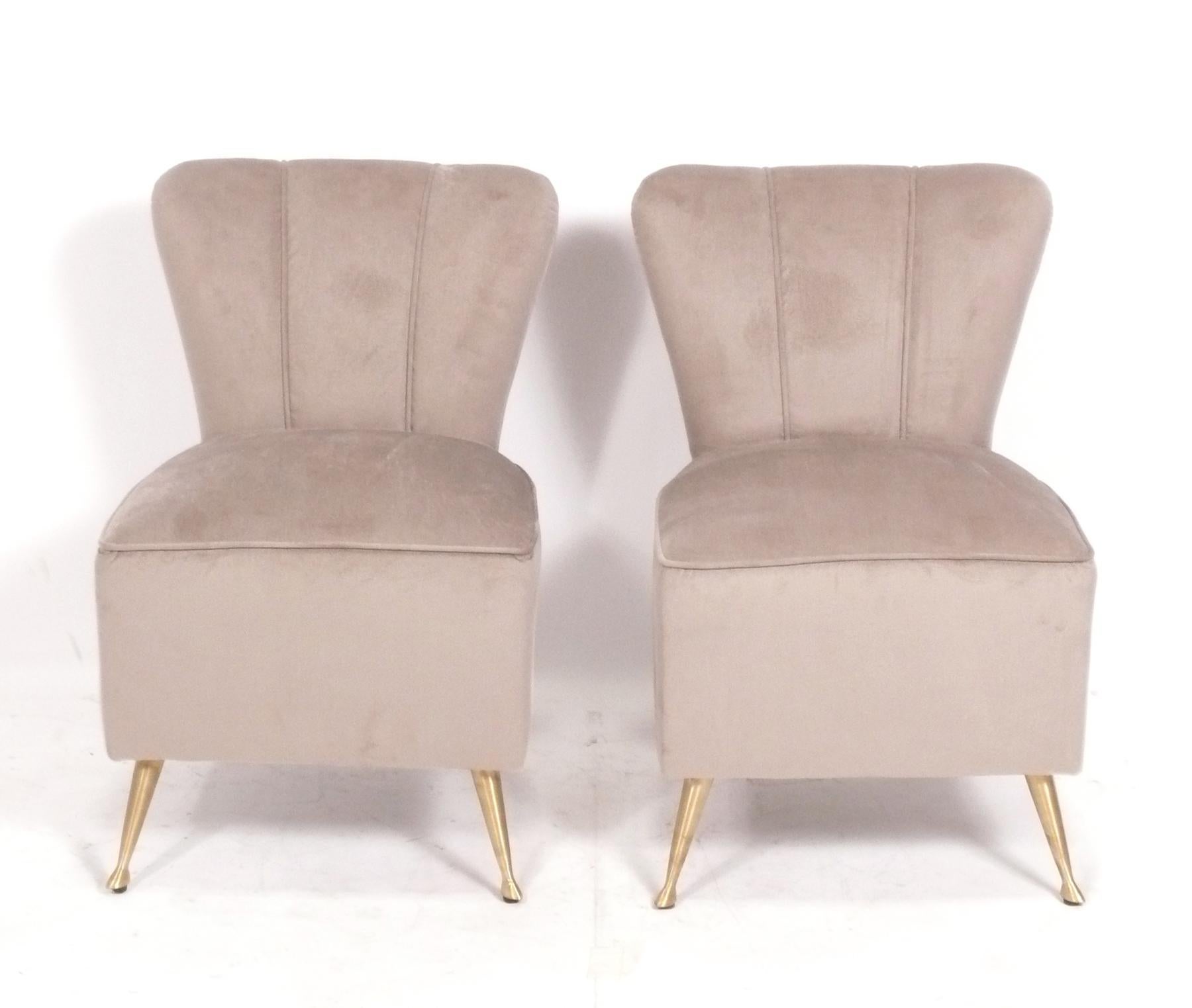 Pair of Petite Italian Mid Century Style Slipper Chairs, Italy, circa 2000s. Based on a 1950s design, these were produced in the 2000s. They look great from every angle. 