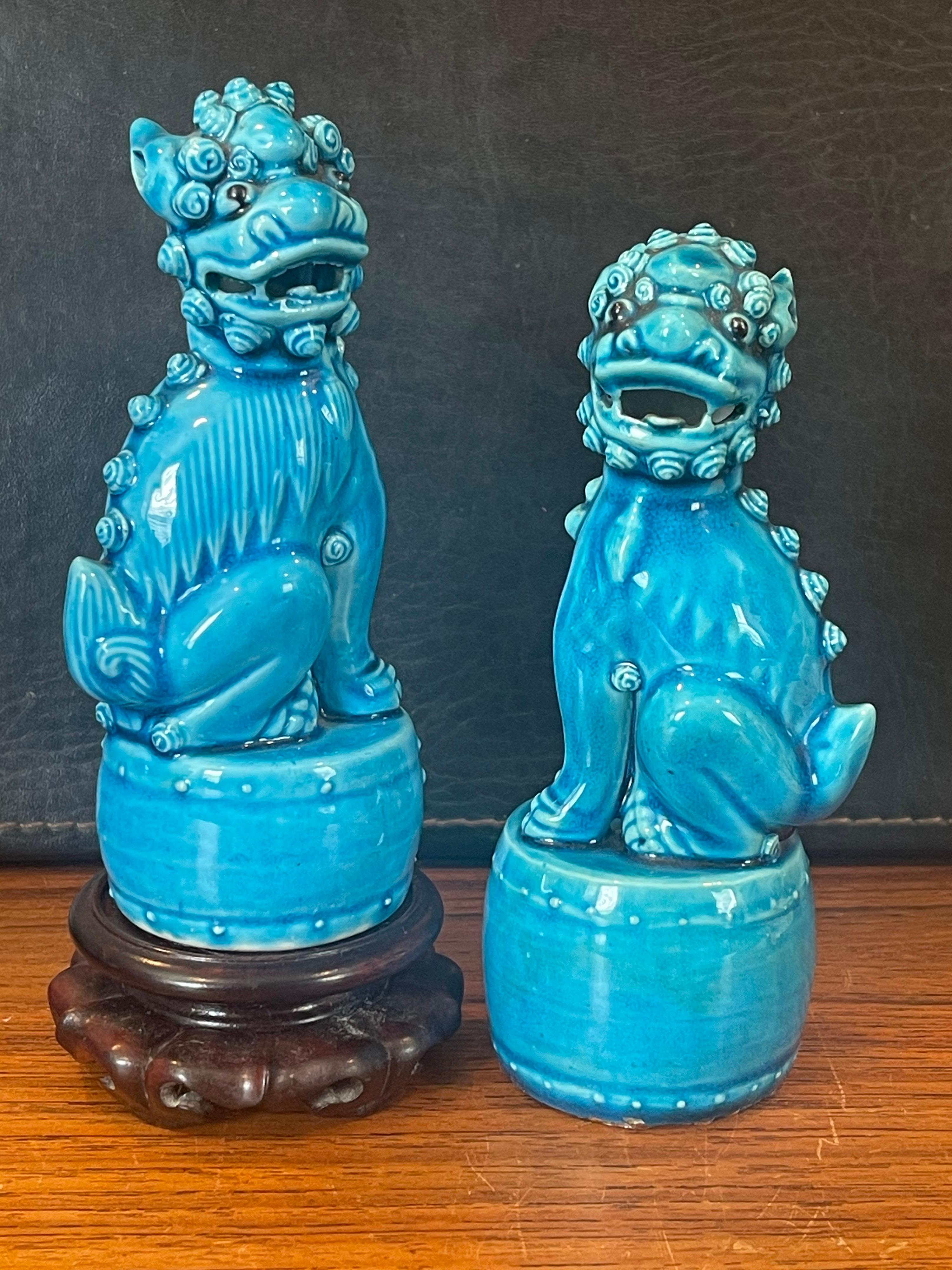 Chinese Pair of Petite Mid-Century Turquoise Blue Ceramic Foo Dog Sculptures For Sale