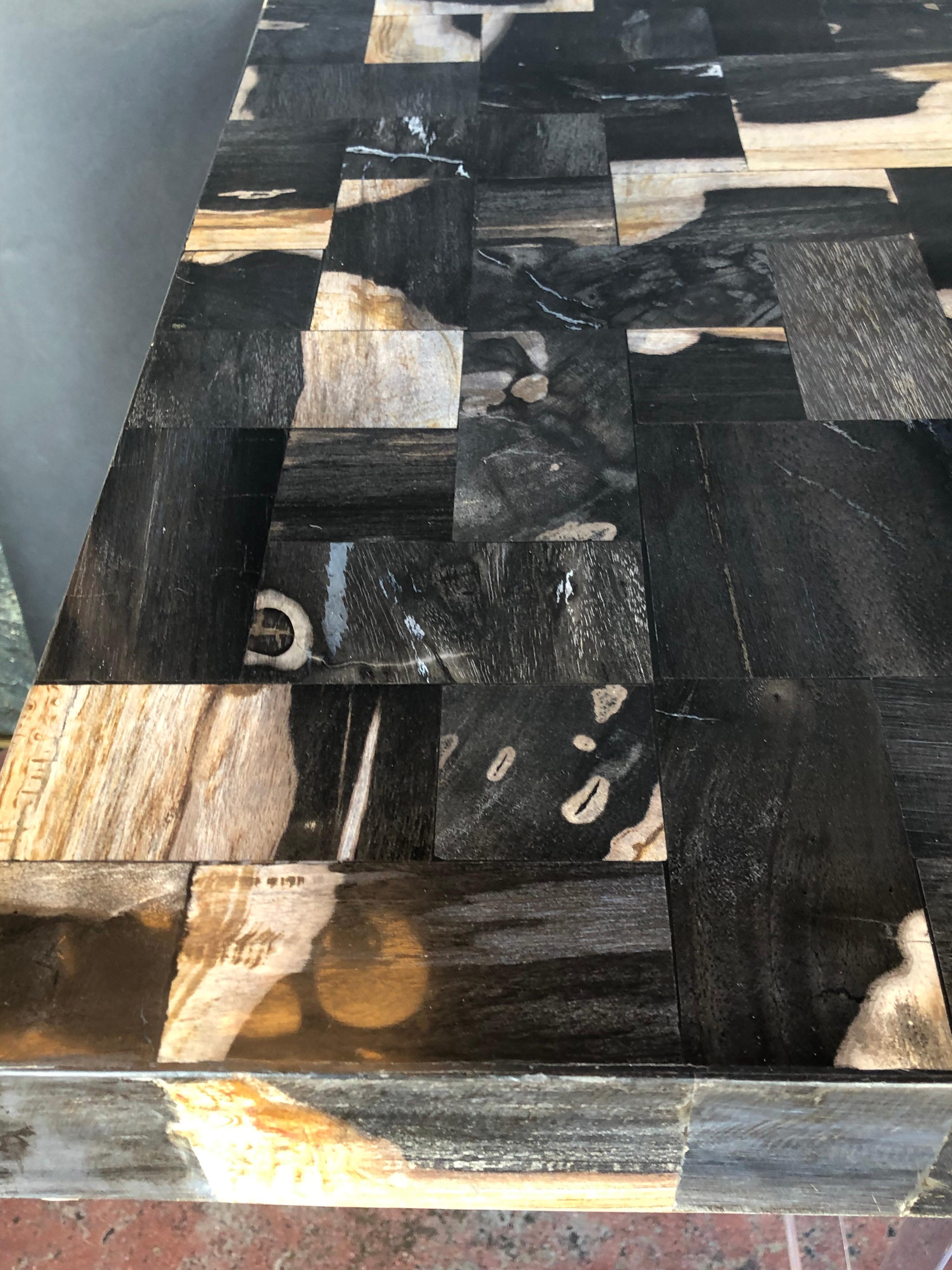 Two side tables with petrified wood tiled top and Lucite legs.