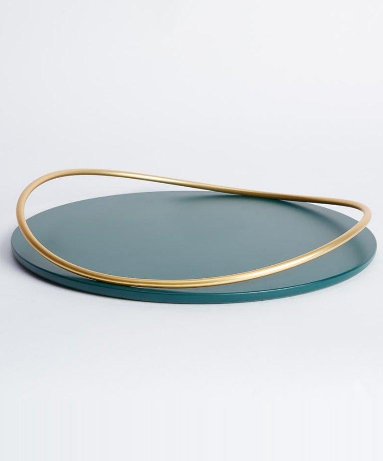 Pair of petrol green Touché a trays by Mason Editions
Dimensions: 36 × 36 × 4.4 cm
Materials: Iron and MDF
Colours: Taupe, cotto, burgundy, sage green, petrol green

A light metal rod that rests on the surface and then lifts up, almost touching