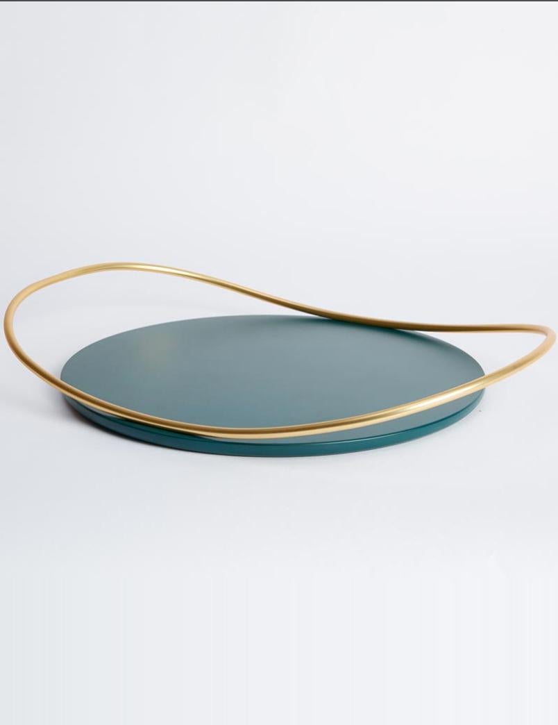 Pair of petrol green touché b tray by Mason Editions
Dimensions: 36 × 47 × 6.7 cm
Materials: Iron and MDF
Colours: taupe, cotto, burgundy, sage green, petrol green

A light metal rod that rests on the surface and then lifts up, almost touching