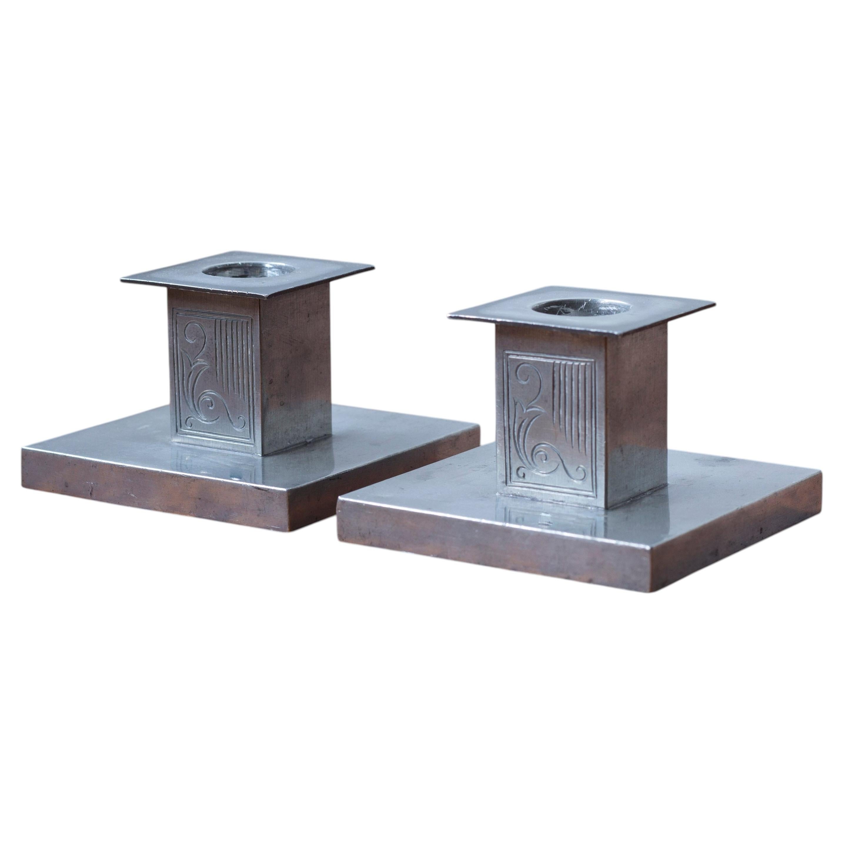 Pair of pewter candlesticks by Sylvia Stave for C. G. Hallberg, 1937 For Sale