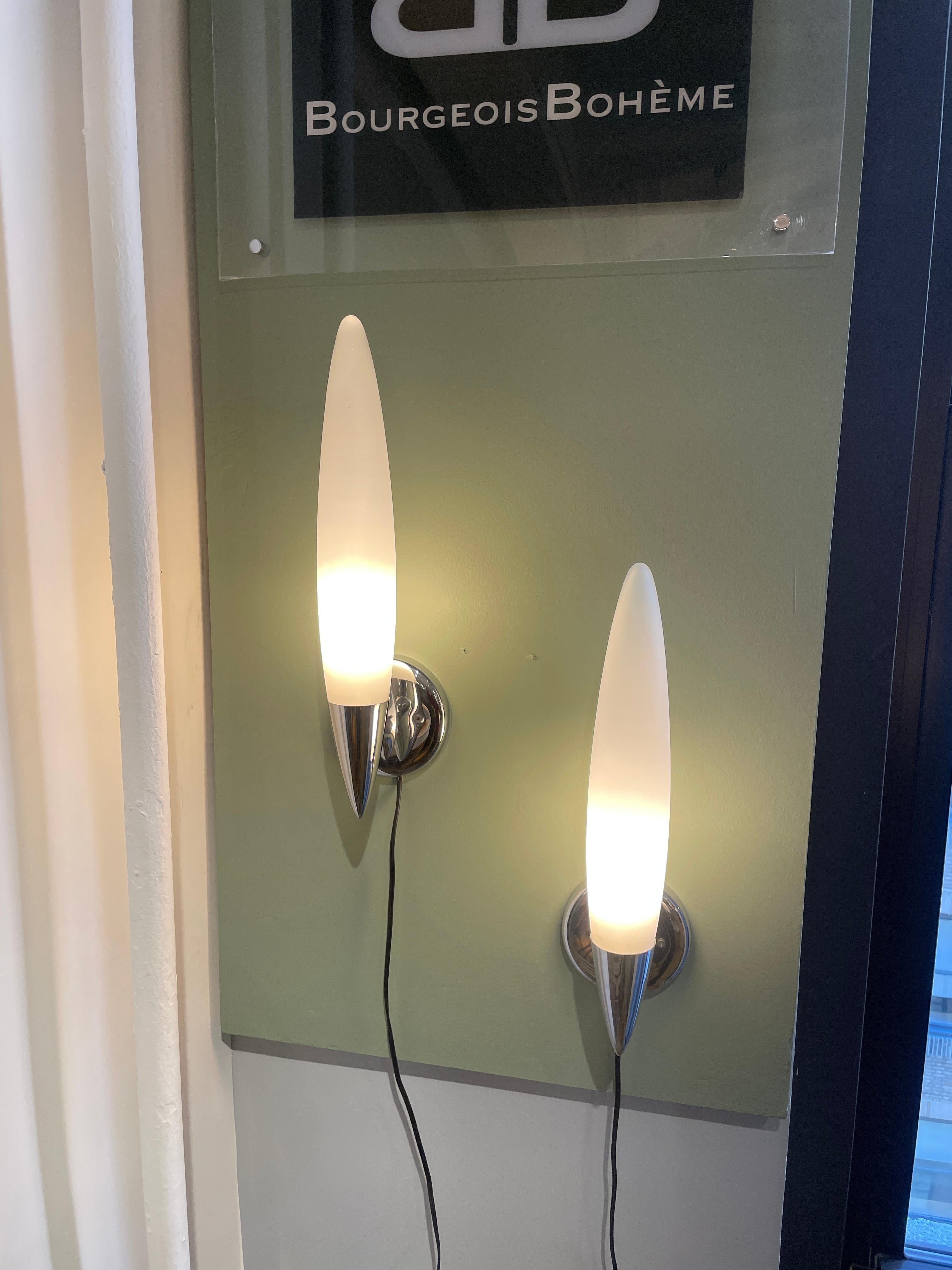 Beautiful pair of sconces by Philippe Starck with Opaline Glass.