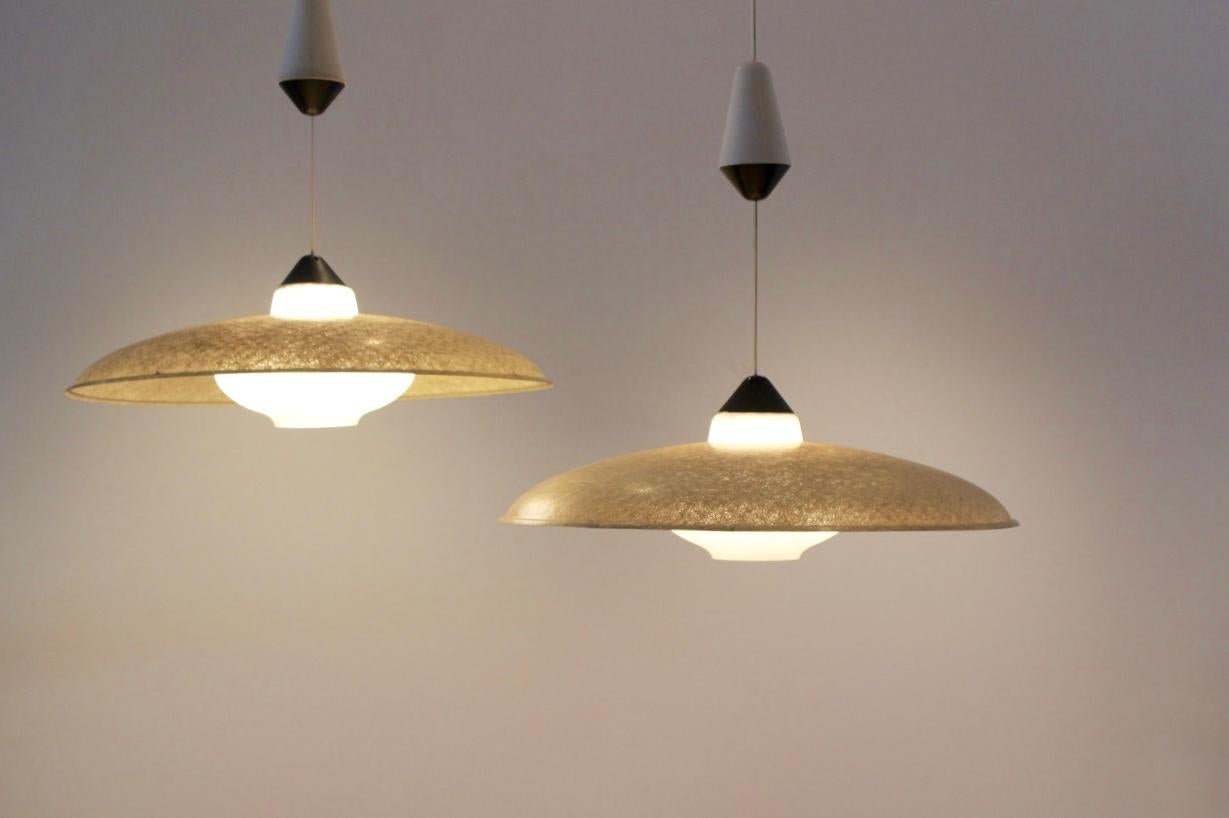Dutch Pair of Philips Fiberglass and Opal Glass Pendant Lamps by Louis Kalff, 1950s