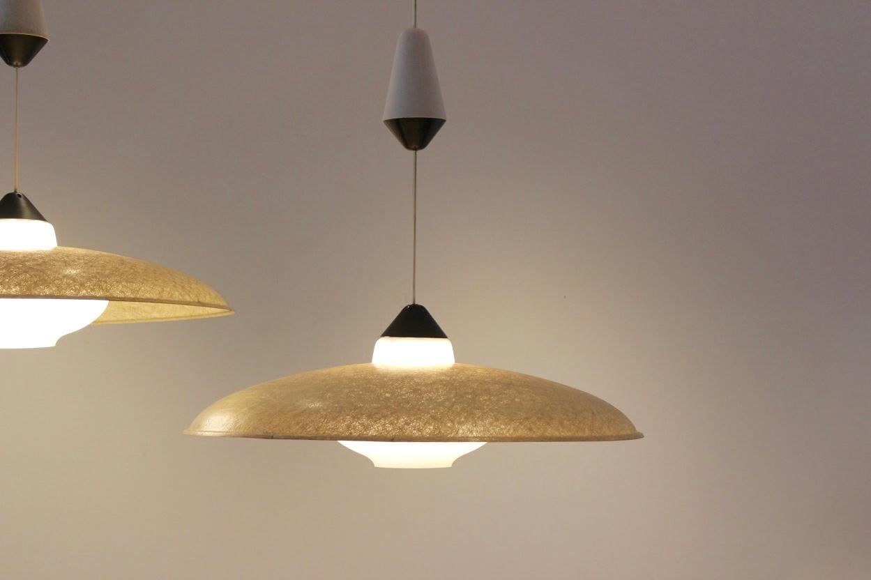 20th Century Pair of Philips Fiberglass and Opal Glass Pendant Lamps by Louis Kalff, 1950s