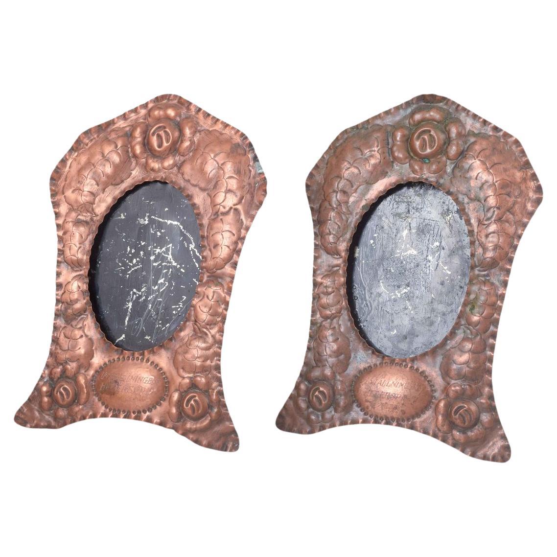 Pair of picture frames in embossed copper. Dated 1933 For Sale