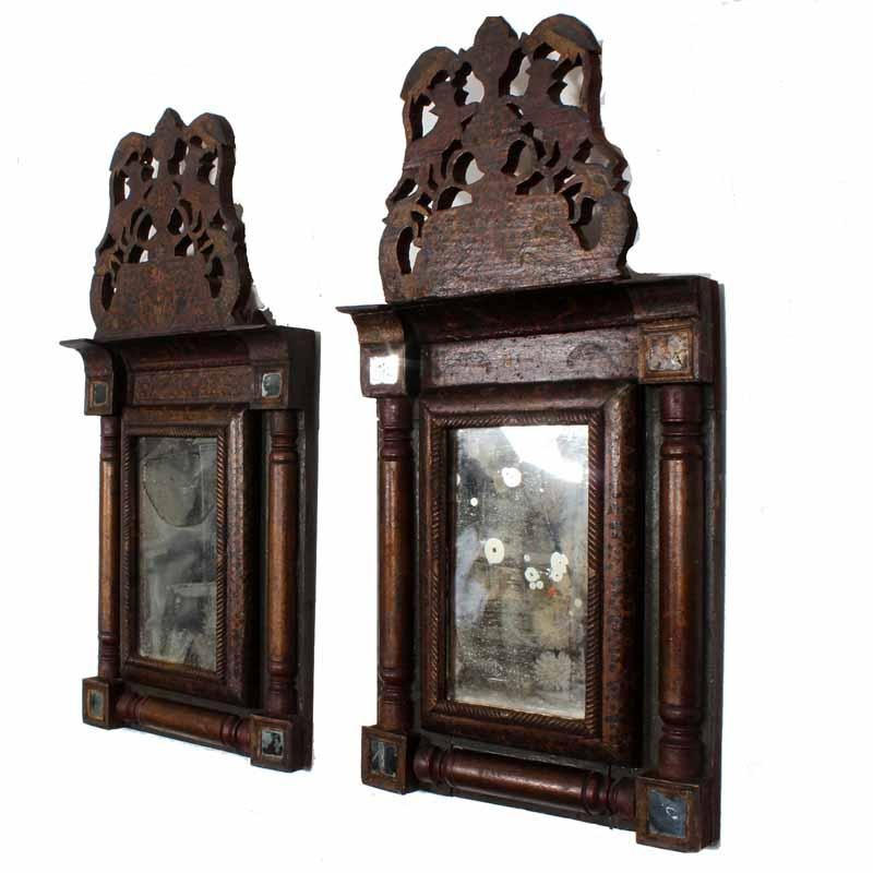 Pair of carved and painted courting mirrors with soulful patina. An interesting combination of French form and Moroccan decoration. Executed in the early to mid-19th century with an old label.