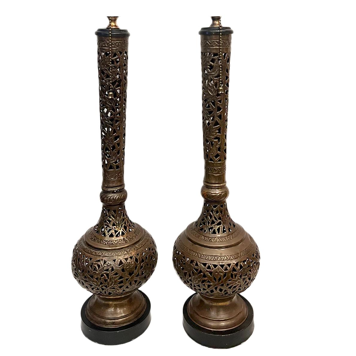 Pair of circa 1950's Moroccan pierced brass foliage lamps.

Measurements:
Height of body: 21.5