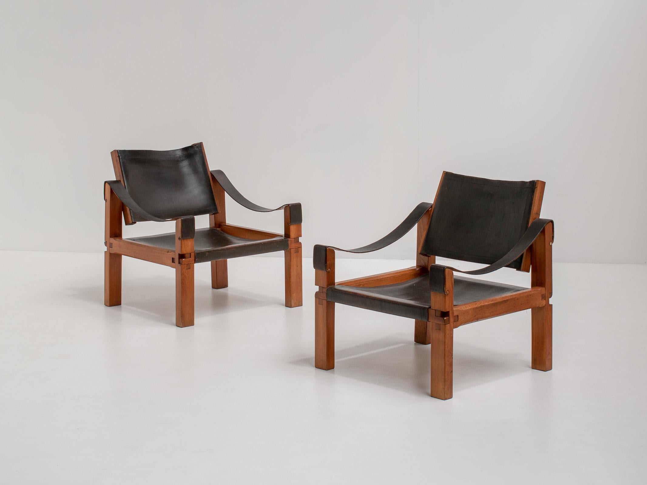 Stunning set of two S10 ‘Sahara’ armchairs by renowned French designer Pierre Chapo, France 1960s

Two pieces of saddle leather are stretched between the beautifully crafted solid elm frame. The armrests are made of leather strips suspended on the