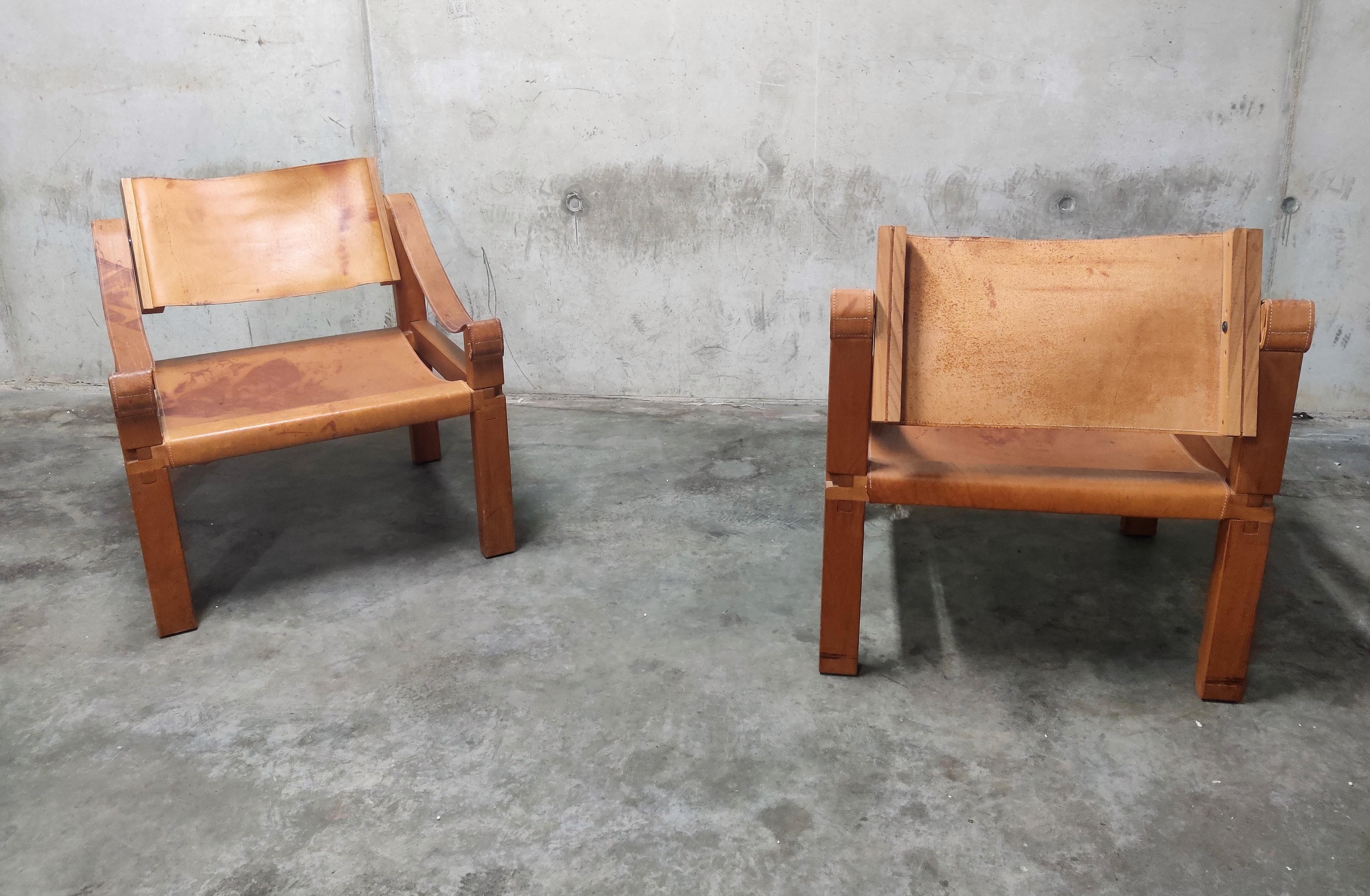 Pair of Pierre Chapo S10 easy chairs in cognac leather and oak.

Designed in the 1960s and produced in solid elm and cognac leather, the S10 chair is one of the most elemental works in Chapo's oeuvre with a straight forward, simple design,