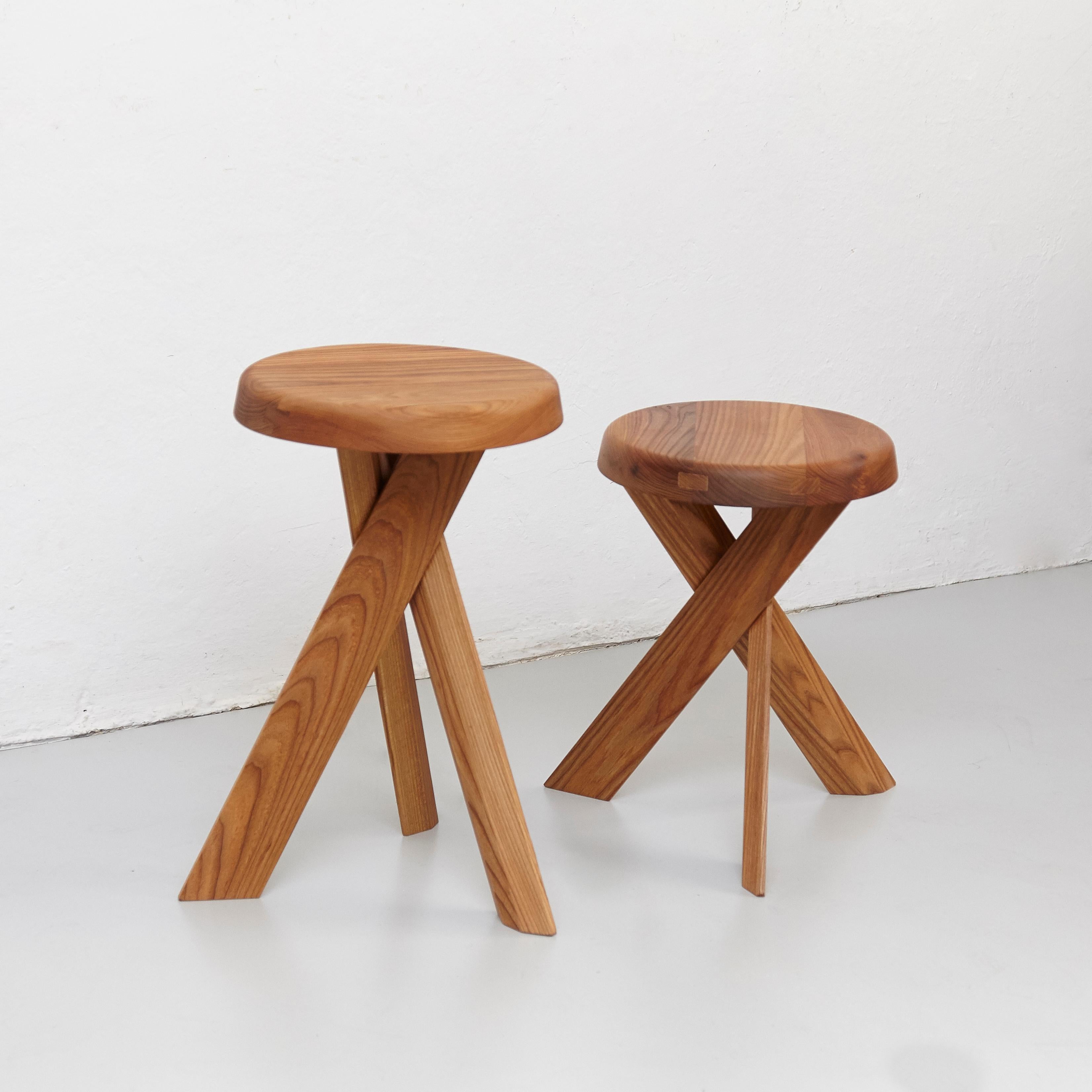 S31A & S31B stools designed by Pierre Chapo, circa 1960.
Manufactured by Chapo Creation in France, 2015.
Solid Elmwood.

Measures: 33 cm x 45 cm / 33 cm x 55 cm 

In good original condition, with minor wear consistent with age and use,