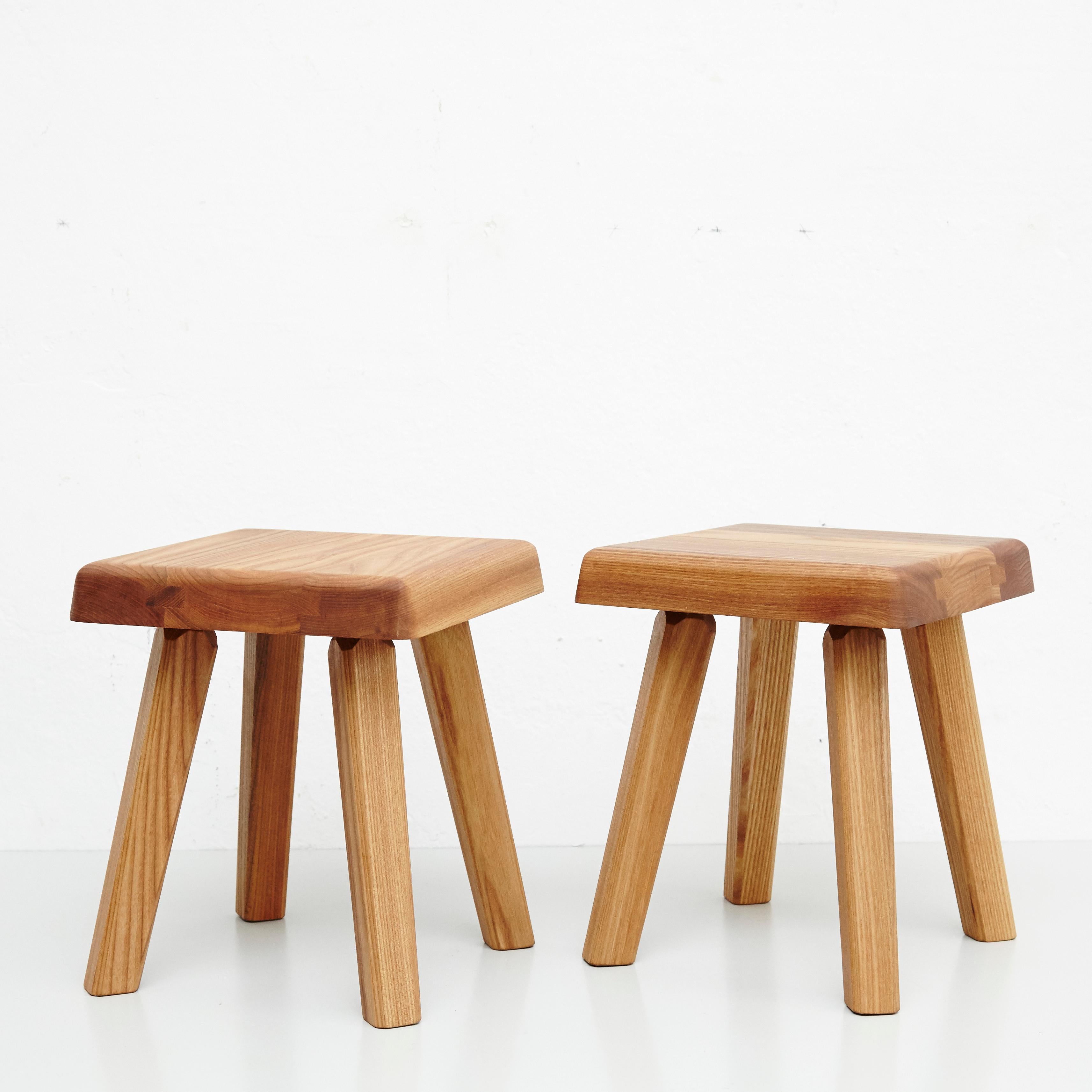 Pair of stool designed by Pierre Chapo in 1960s.
Manufactured by Creation Chapo in France in 2020.

Solid elmwood.

In good original condition, with minor wear consistent with age and use, preserving a beautiful patina.

Pierre Chapo is born