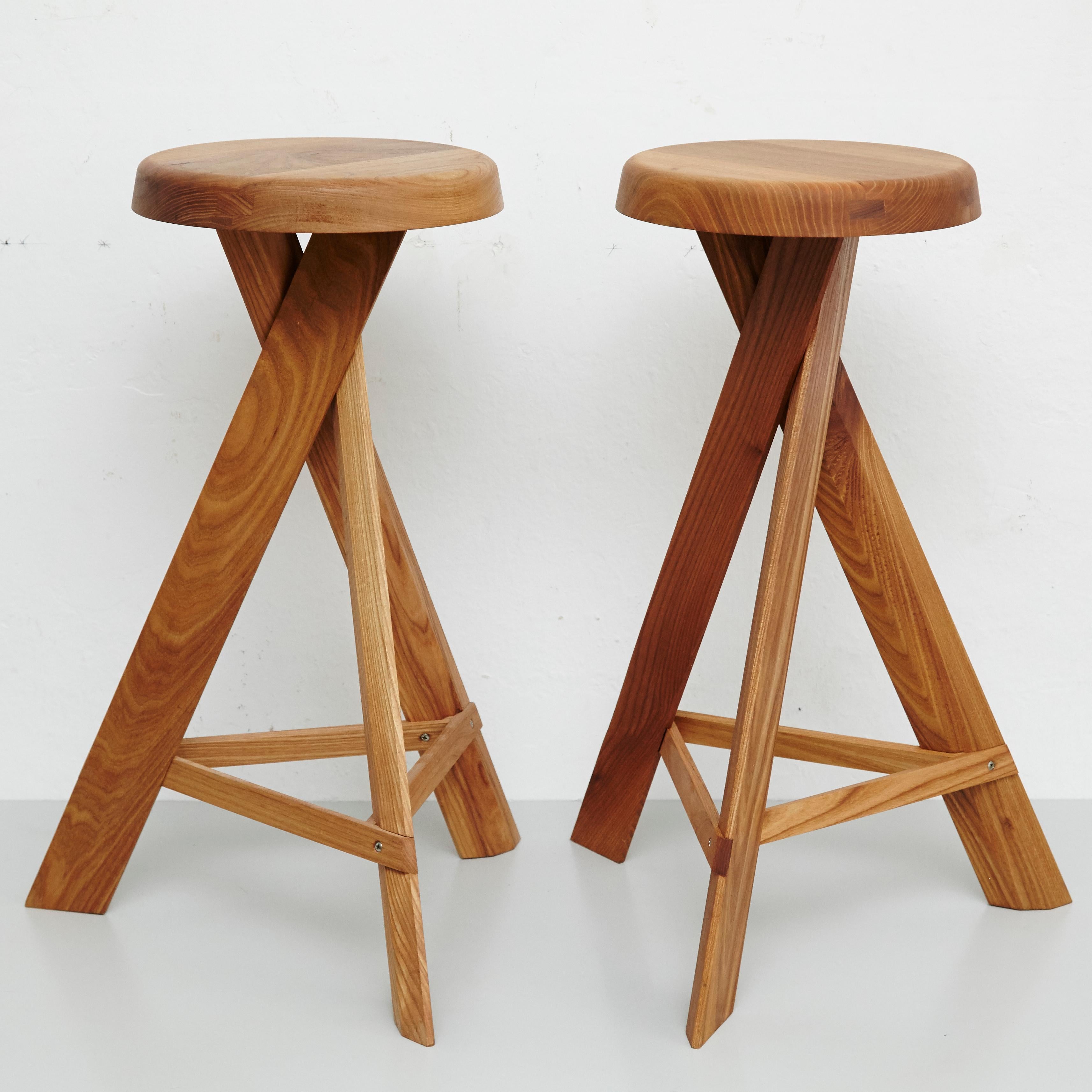 Pair of S 31 C stools designed by Pierre Chapo, circa 1960.
Manufactured by Pierre Chapo in France, 2020.
Solid elmwood.

In good original condition, with minor wear consistent with age and use, preserving a beautiful patina.

Pierre Chapo is