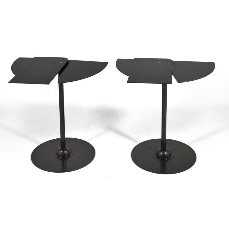 Striking pair of French side tables designed in 1929 by Pierre Chareau of anthracite lacquered steel. The 