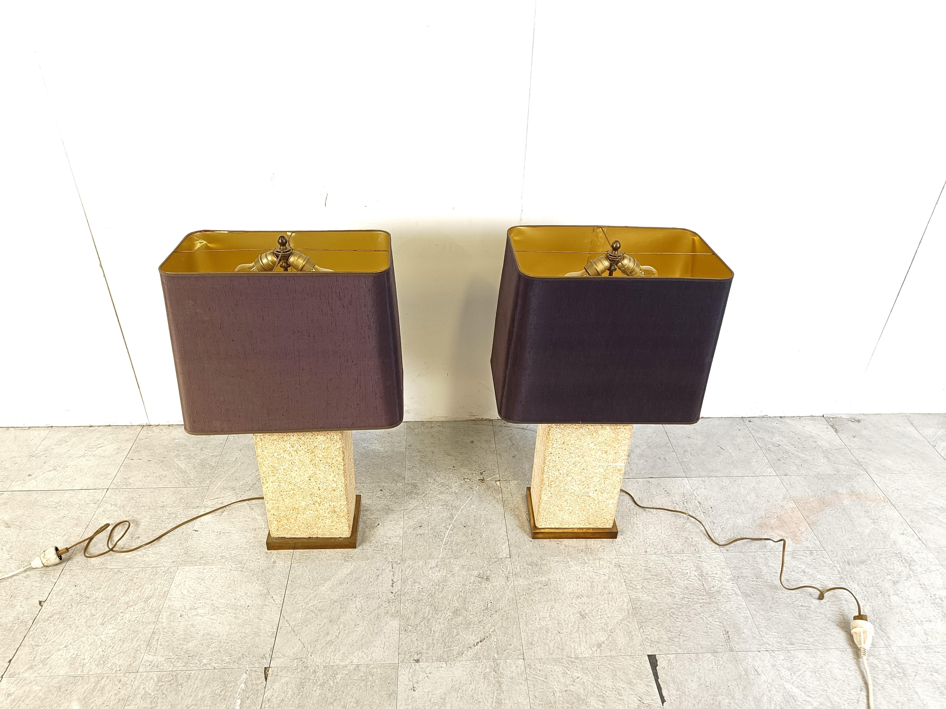 Exquisite Pierre De France natural stone table lamps with Brass bases.

Beautiful and stately pair of table lamps.

1970s - France

Tested and ready for use with a 2 regular E26/E27 size light bulb holders each.

The lamps come with their original