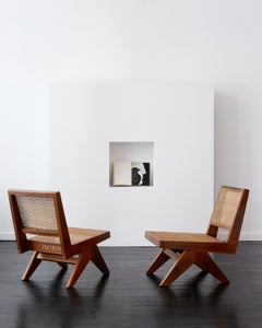 Pair of Pierre Jeanneret Armless Easy Lounge Chairs c. 1960. Model PJ-010125.
