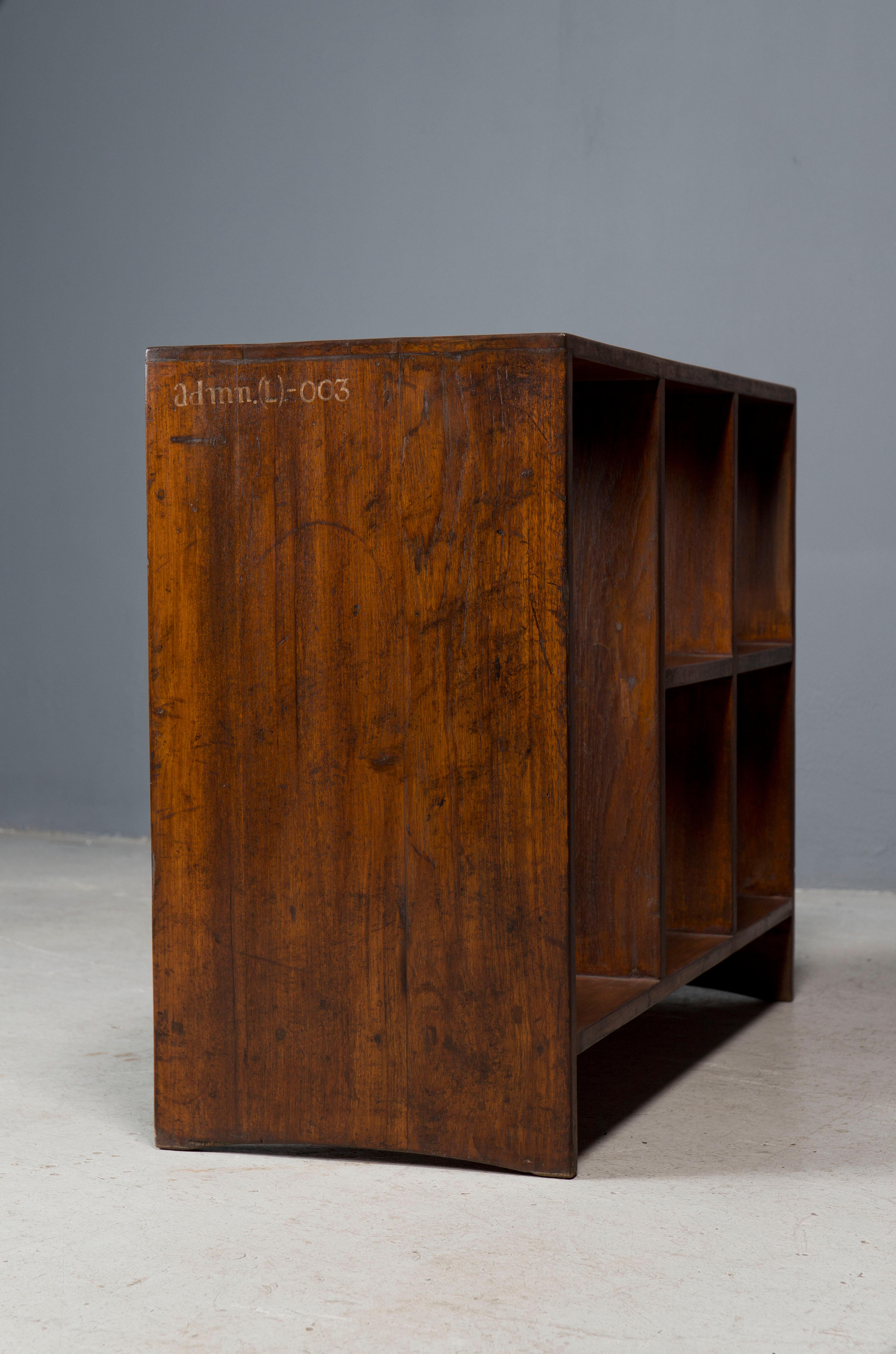 Rare pair of Pierre Jeanneret five hole file racks c 1950 with exceptional patina and markings. 

Designed and from Chandigarh administrative buildings.