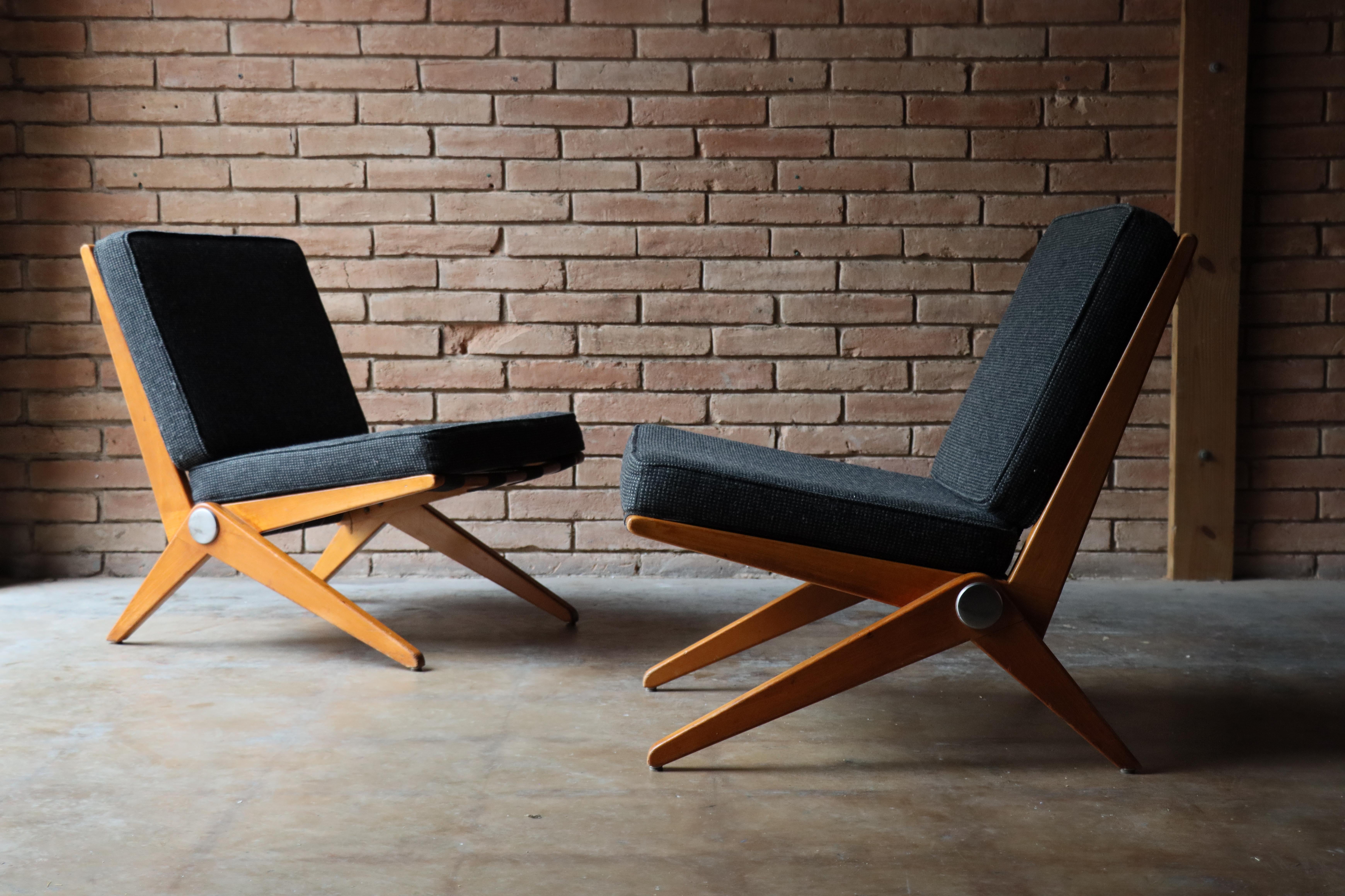 Pair of vintage ‘scissor’ chairs designed by Pierre Jeanneret for Knoll International - 1948

 A harmonious blend of form and function. Crafted with precision, these chairs boast a distinctive scissor-like frame, marrying classic modern design with